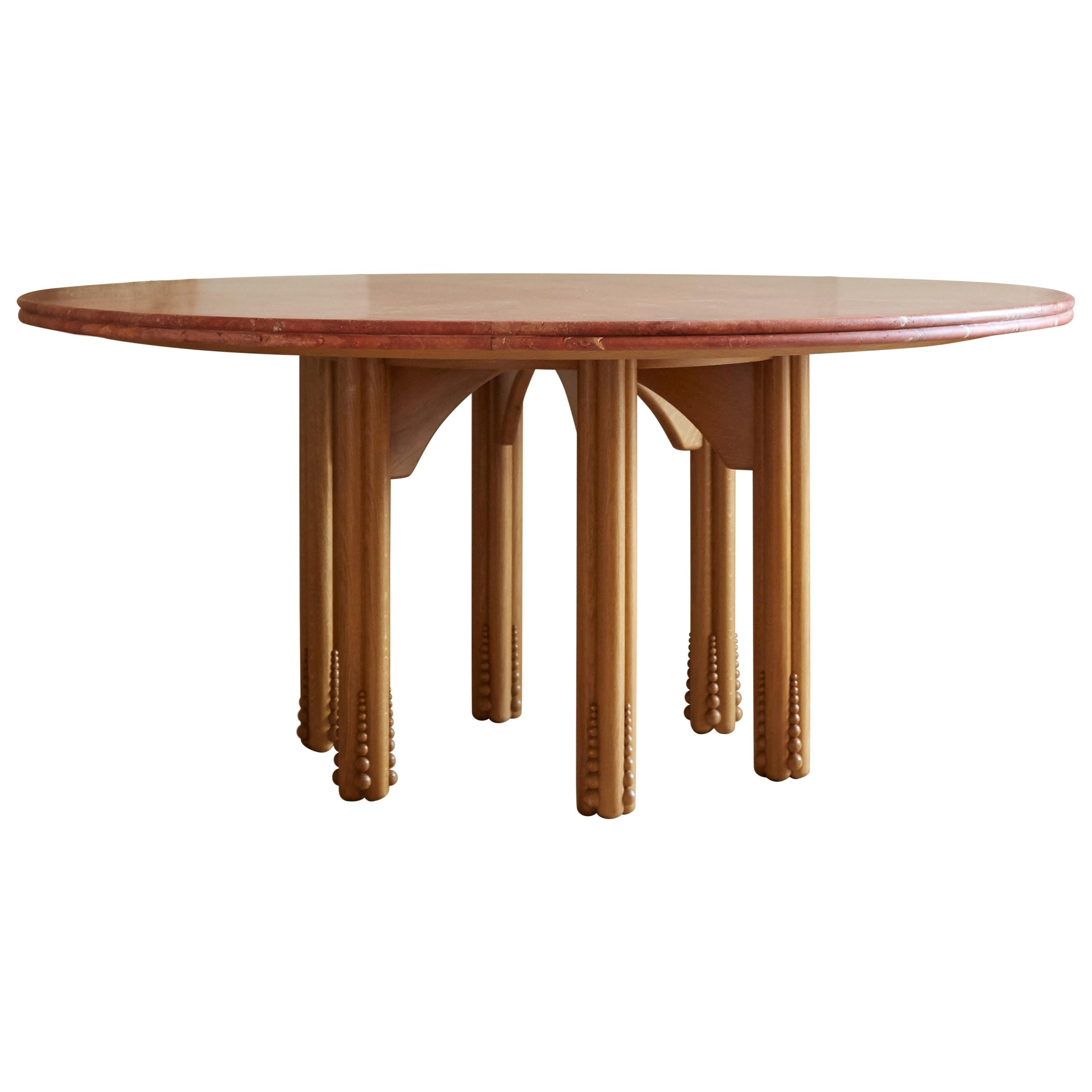 https://a.1stdibscdn.com/octopus-round-dining-table-with-travertine-top-designed-by-laura-gonzalez-for-sale/1121189/f_229494221616150306004/22949422_master.jpg
