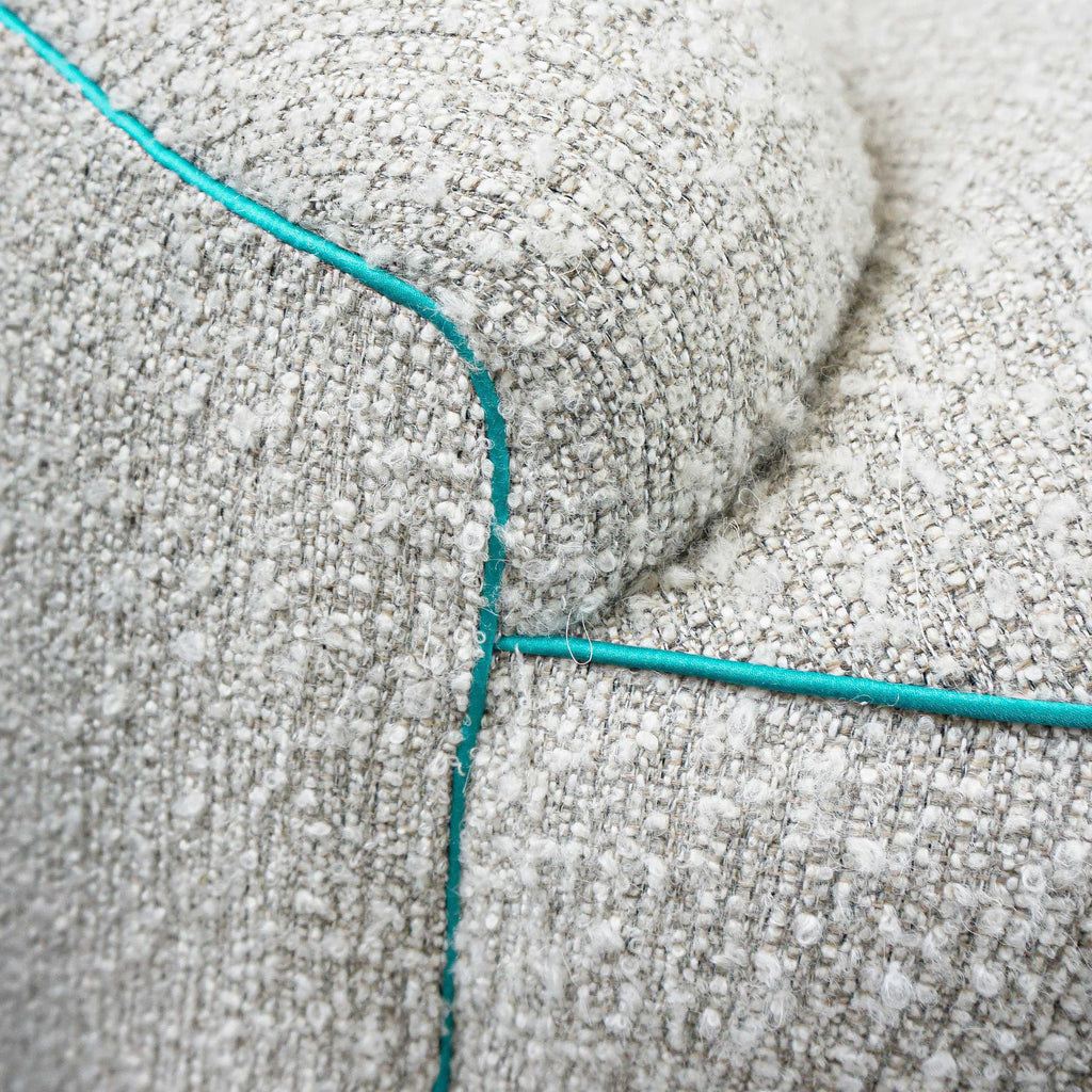 https://a.1stdibscdn.com/boucle-curved-sofa-with-turquoise-accents-for-sale-picture-18/f_21233/1622750925405/22_master.jpg