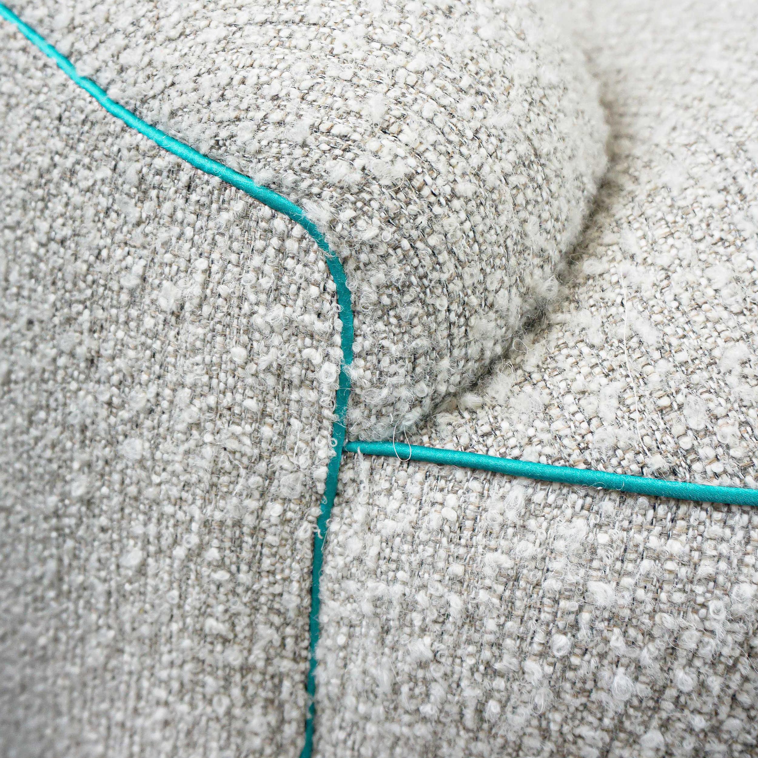 https://a.1stdibscdn.com/boucle-curved-sofa-with-turquoise-accents-for-sale-picture-18/f_21233/1622750925405/22_master.jpg