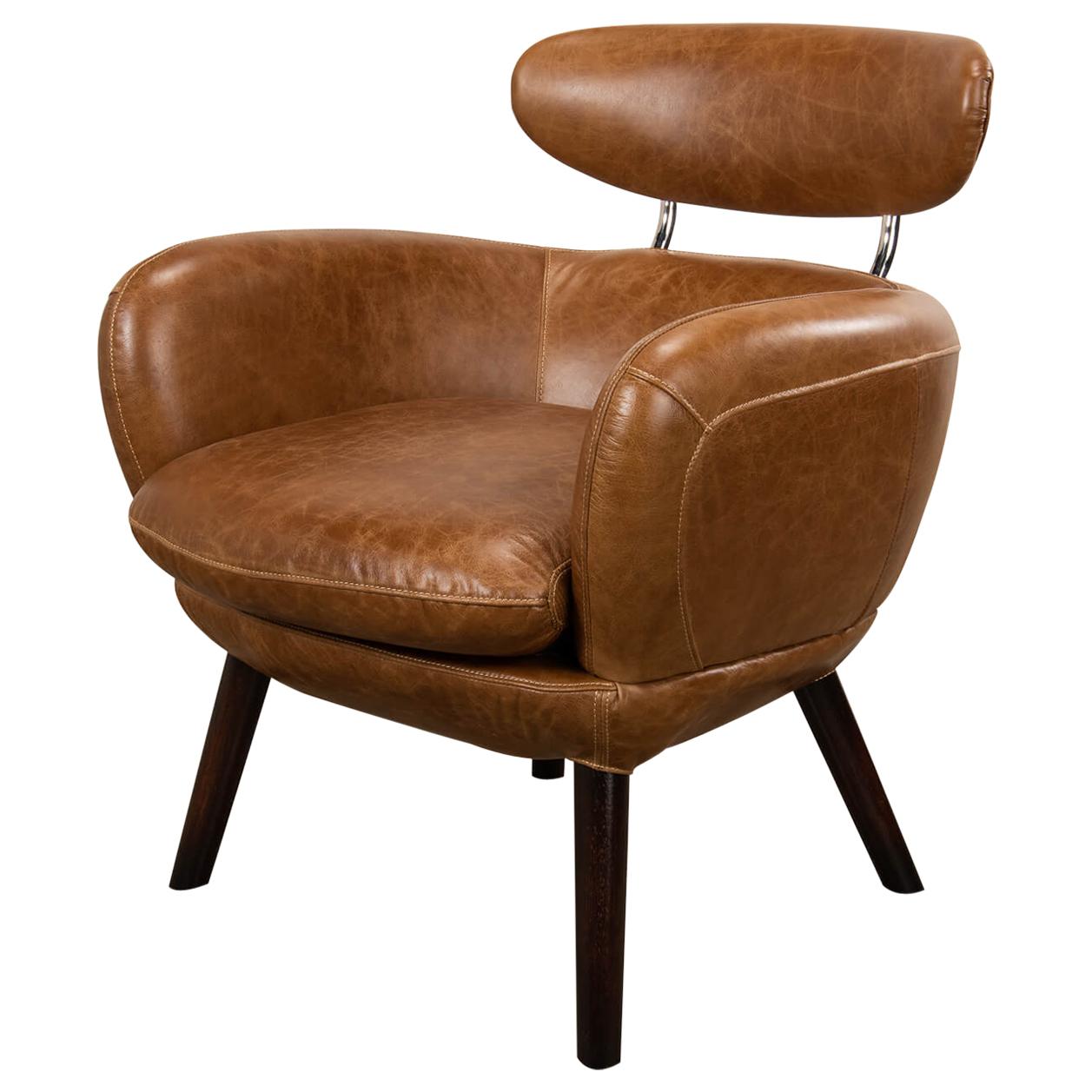 https://a.1stdibscdn.com/mid-century-leather-armchair-for-sale/1121189/f_230044421616242694199/23004442_master.jpg