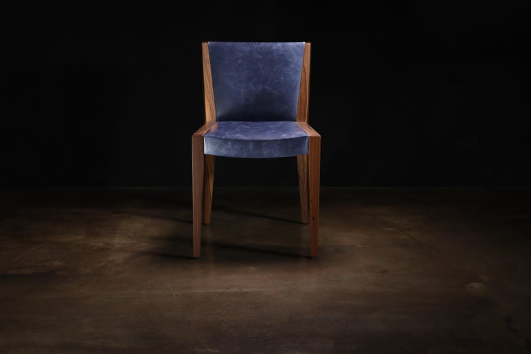 https://a.1stdibscdn.com/modern-exotic-wood-and-wrapped-leather-dining-chair-from-costantini-giovanni-for-sale-picture-3/f_25173/f_339900321682508183613/230420_Giovanni_Chair_01_master.jpg?width=768