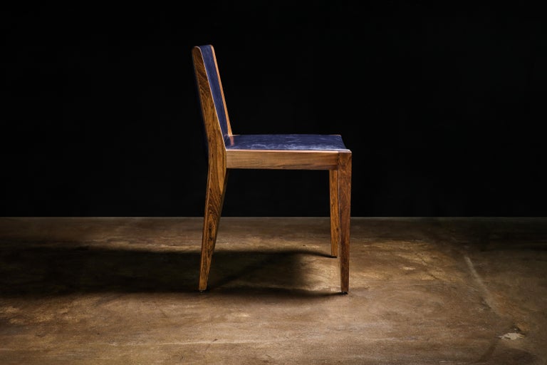 https://a.1stdibscdn.com/modern-exotic-wood-and-wrapped-leather-dining-chair-from-costantini-giovanni-for-sale-picture-5/f_25173/f_339900321682508185920/230420_Giovanni_Chair_02_master.jpg?width=768