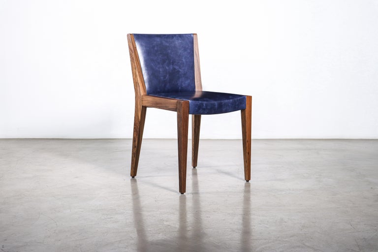 https://a.1stdibscdn.com/modern-exotic-wood-and-wrapped-leather-dining-chair-from-costantini-giovanni-for-sale-picture-9/f_25173/f_339900321682508180776/230421_Giovanni_Chair_00_master.jpg?width=768