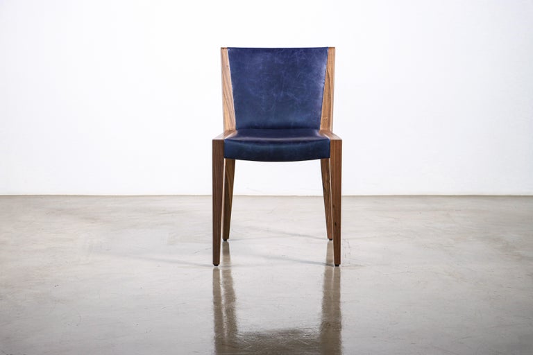 https://a.1stdibscdn.com/modern-exotic-wood-and-wrapped-leather-dining-chair-from-costantini-giovanni-for-sale-picture-10/f_25173/f_339900321682508200667/230421_Giovanni_Chair_01_master.jpg?width=768