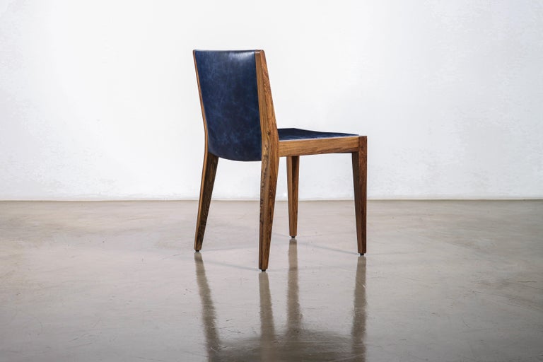 https://a.1stdibscdn.com/modern-exotic-wood-and-wrapped-leather-dining-chair-from-costantini-giovanni-for-sale-picture-12/f_25173/f_339900321682508195041/230421_Giovanni_Chair_03_master.jpg?width=768