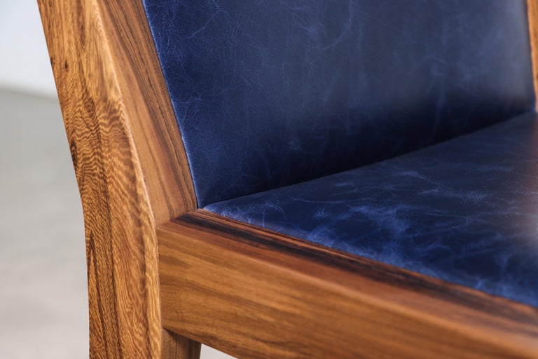 https://a.1stdibscdn.com/modern-exotic-wood-and-wrapped-leather-dining-chair-from-costantini-giovanni-for-sale-picture-18/f_25173/f_339900321682508200107/230421_Giovanni_Chair_12_master.jpg?width=768