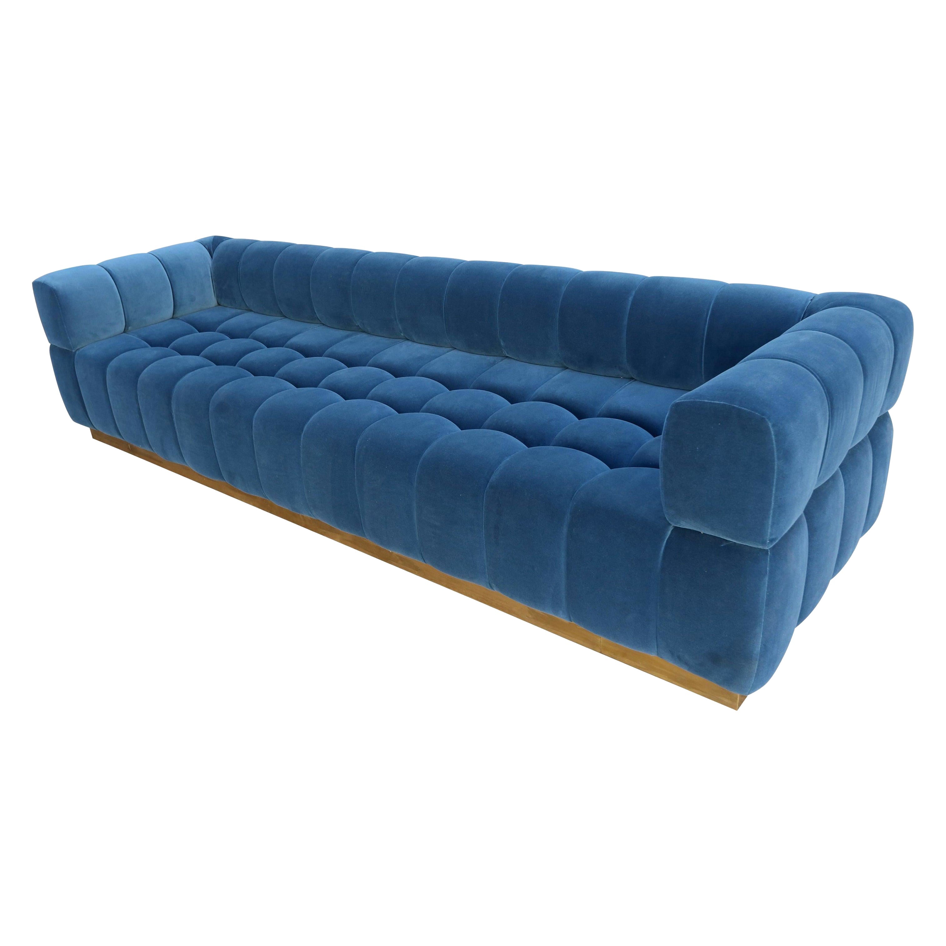 https://a.1stdibscdn.com/custom-tufted-blue-velvet-sofa-with-brass-base-by-adesso-imports-for-sale/1121189/f_231056521749880665982/23105652_datamatics.jpg
