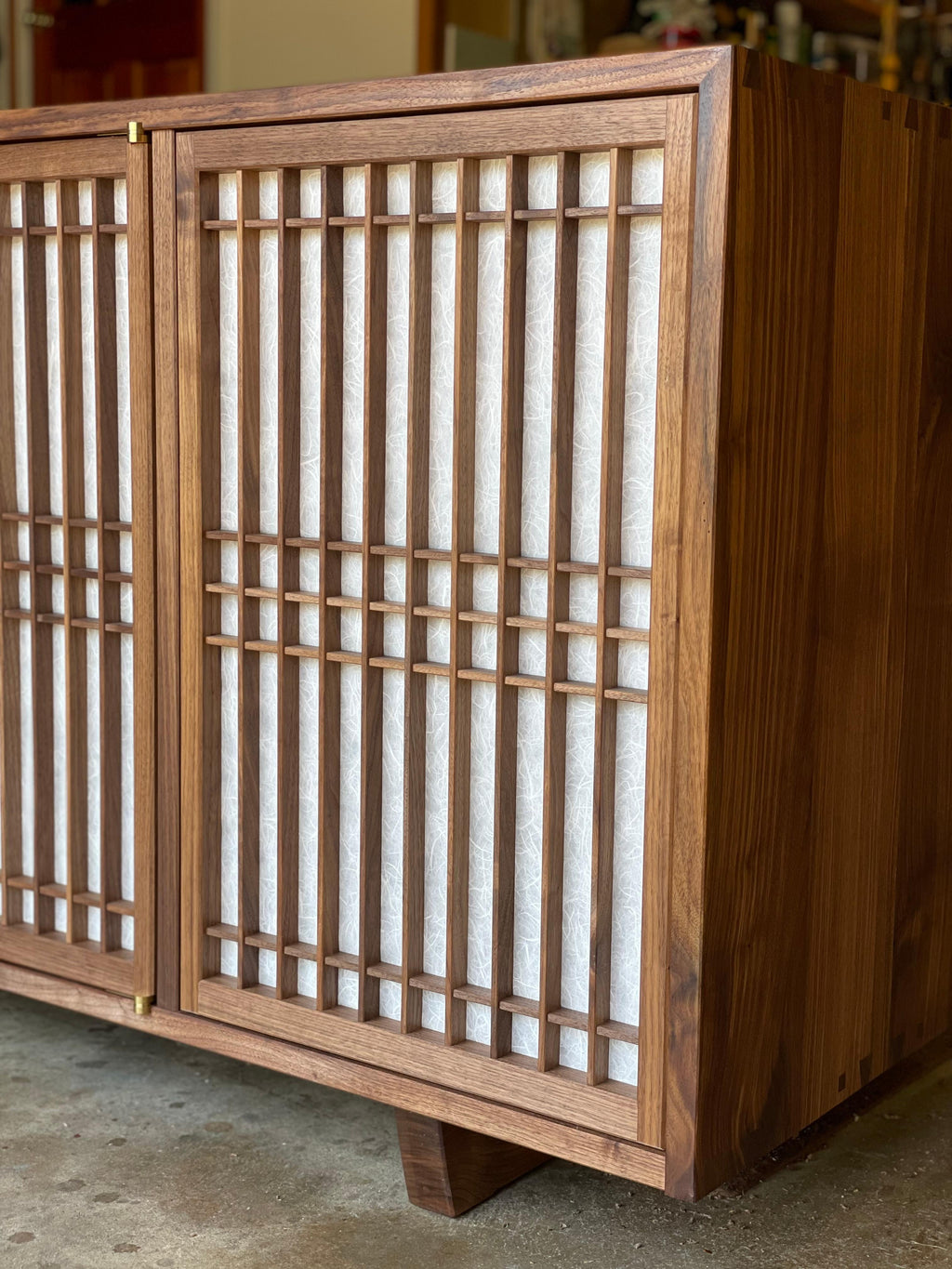 https://a.1stdibscdn.com/walnut-media-cabinet-room-divider-with-shoji-doors-for-sale-picture-7/f_45782/f_291309321655341949165/231C09C8_078D_44EF_9A46_F4773FA966B1_master.jpeg