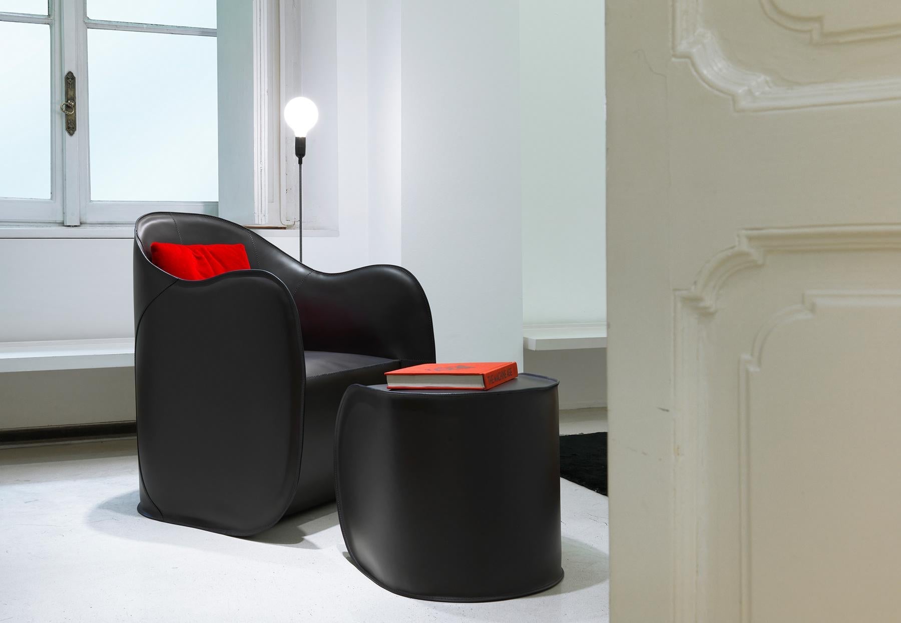https://a.1stdibscdn.com/21st-century-modern-ultralight-armchair-and-pouf-set-in-hide-leather-for-sale-picture-8/f_48381/f_161783121740494334531/2335eedd_c5d4_4ae8_bf16_92e67dd45815_rw_1920_master.jpg
