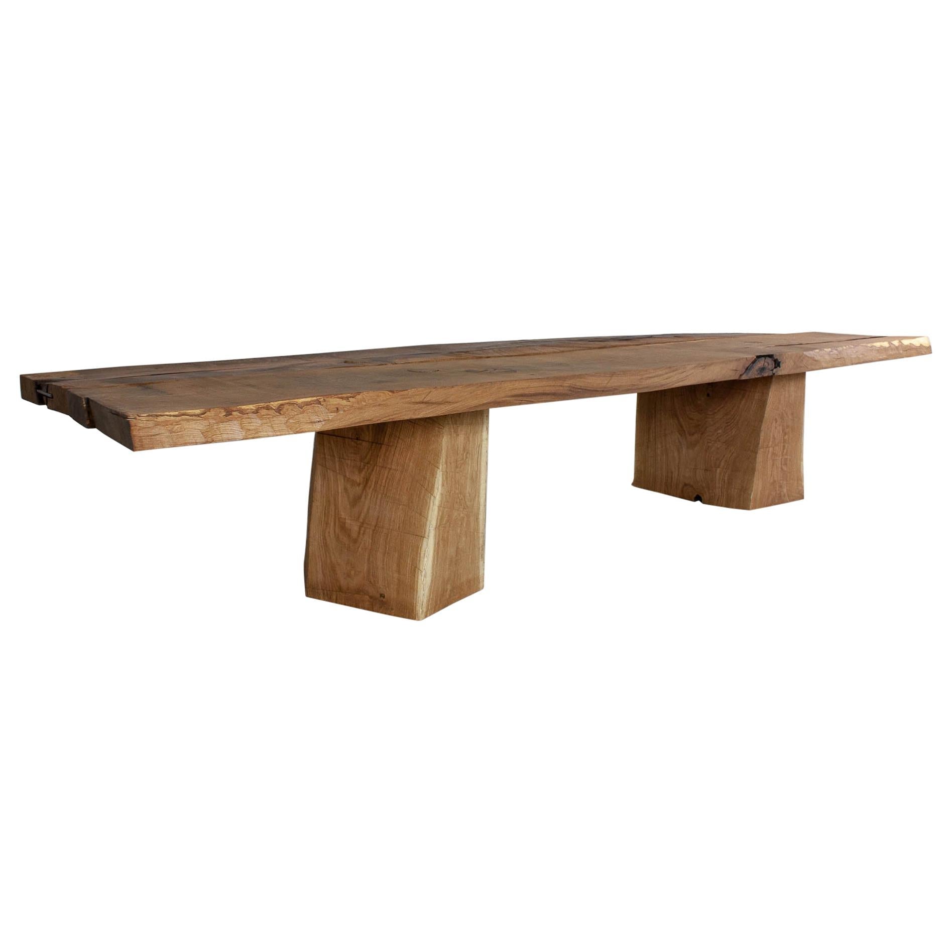 https://a.1stdibscdn.com/sculpted-massive-dining-table-v3-in-solid-oakwood-custom-size-for-sale/1121189/f_234073321618660393611/23407332_master.jpg