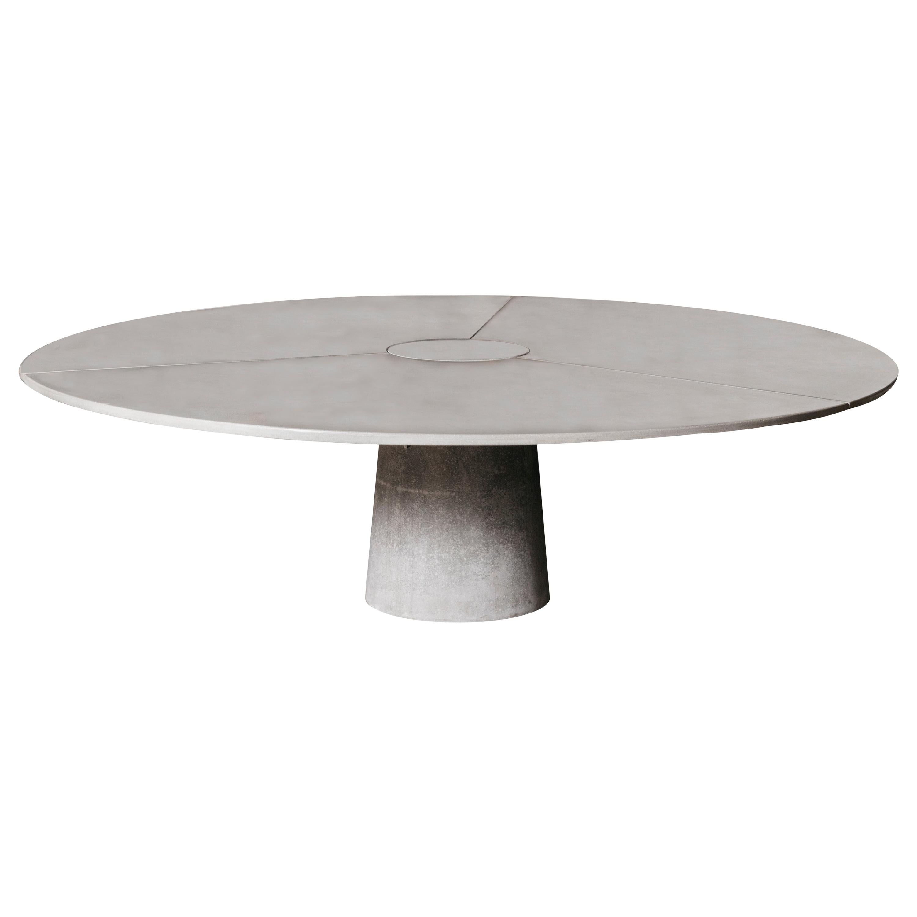 https://a.1stdibscdn.com/james-de-wulf-concrete-3-piece-locking-round-table-for-sale/1121189/f_234782221619172771324/23478222_master.jpg