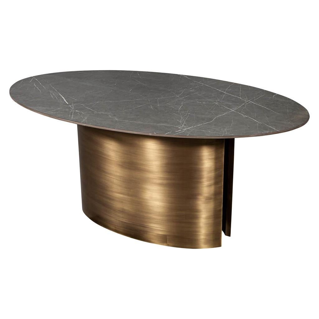 https://a.1stdibscdn.com/custom-oval-porcelain-top-dining-table-with-brass-demi-lune-base-by-carrocel-for-sale/1121189/f_235774921619869825726/23577492_master.jpg