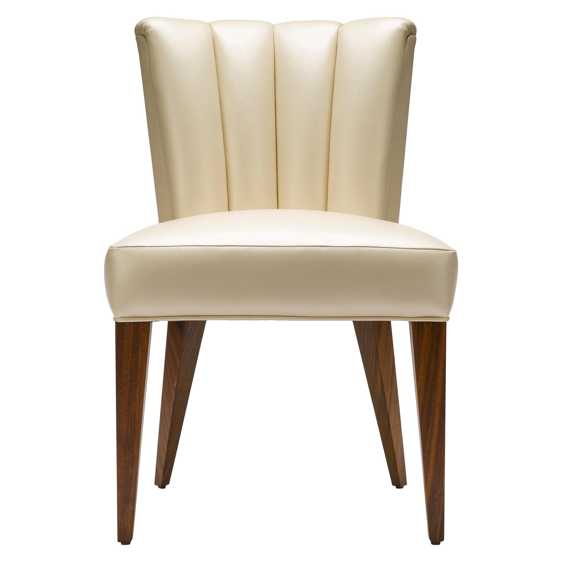 https://a.1stdibscdn.com/contemporary-elodie-dining-chair-in-champagne-pearlized-leather-with-walnut-legs-for-sale/1121189/f_236558121620427309343/23655812_master.jpg