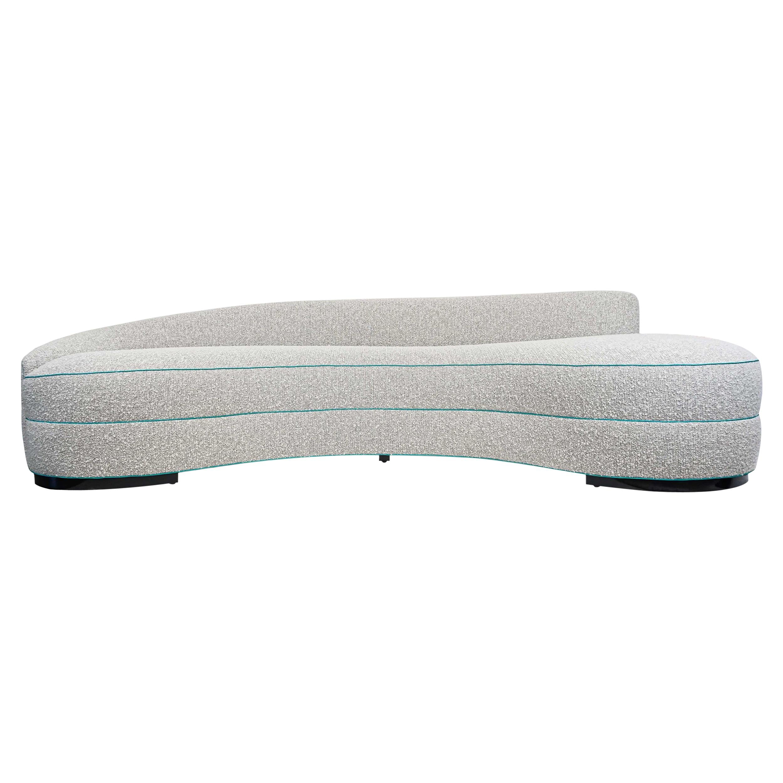 https://a.1stdibscdn.com/boucle-curved-sofa-with-turquoise-accents-for-sale/1121189/f_240306721623687963931/24030672_master.jpg