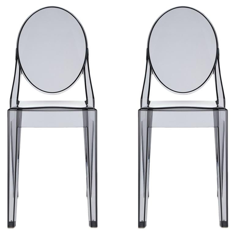 https://a.1stdibscdn.com/set-of-2-kartell-victoria-ghost-chairs-in-smoke-grey-by-philippe-starck-for-sale/1121189/f_242646521624481315847/24264652_master.jpg