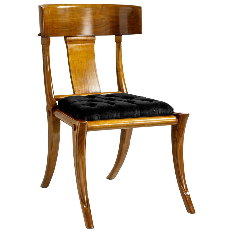 https://a.1stdibscdn.com/klismos-walnut-wood-saber-legs-black-velvet-dining-chairs-customizable-for-sale/1121189/f_242805221624561236876/24280522_master.jpg?width=768