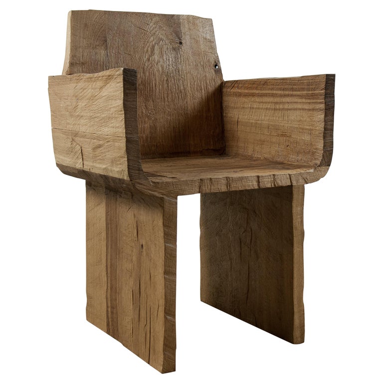 https://a.1stdibscdn.com/sculpted-armchair-in-solid-oak-wood-for-sale/1121189/f_243490221625069785081/24349022_master.jpg?width=768