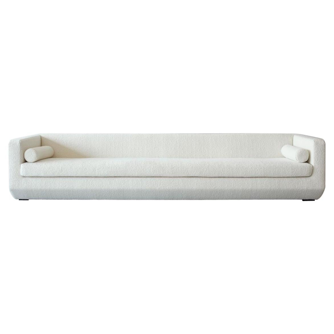 https://a.1stdibscdn.com/large-beveled-couch-by-marc-dibeh-for-sale/f_12192/f_335250521680013420541/24412882_master.jpg