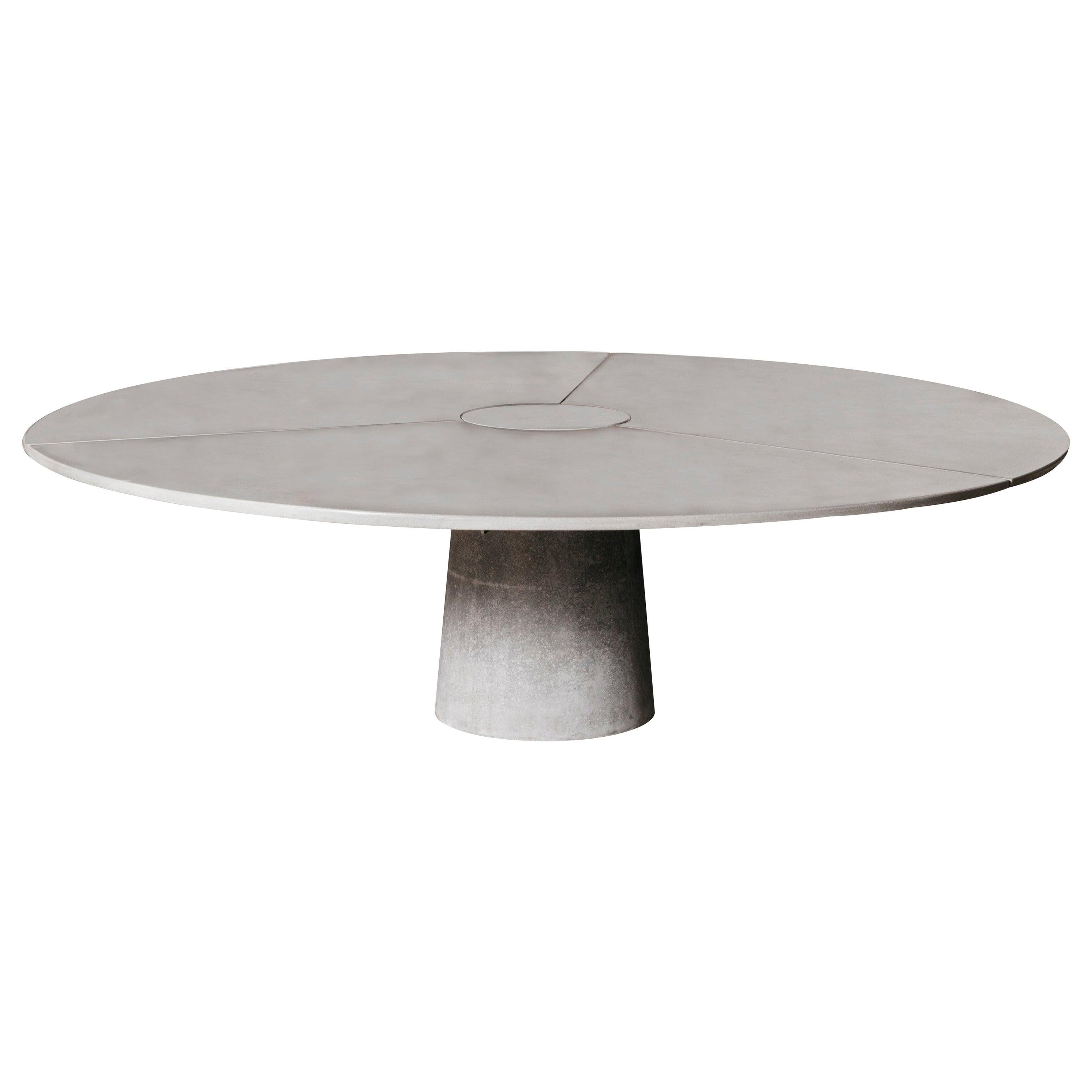 https://a.1stdibscdn.com/james-de-wulf-concrete-3-piece-locking-round-table-120-for-sale/1121189/f_247654621628084985409/24765462_master.jpg