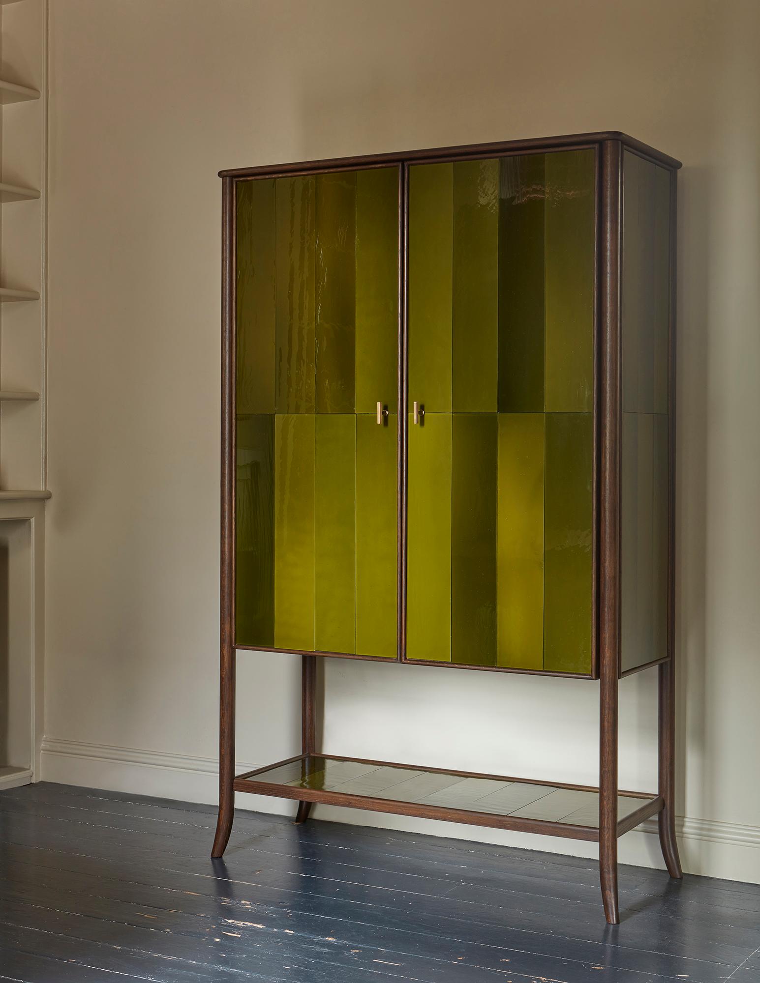 https://a.1stdibscdn.com/rupert-bevan-green-hand-blown-cathedral-glass-cabinet-two-shelves-for-sale-picture-2/f_95862/f_451062321747746339201/250321_Low_res_doors_closed_bespoke_green_cabinet_James_M_master.jpg