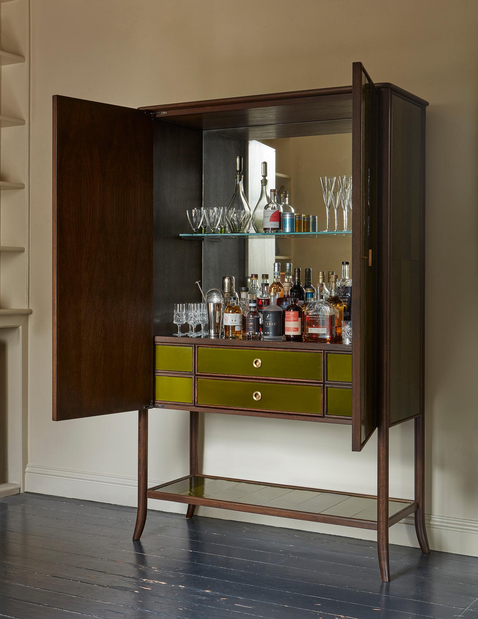 https://a.1stdibscdn.com/rupert-bevan-green-hand-blown-cathedral-glass-cabinet-two-shelves-for-sale-picture-4/f_95862/f_451062321747746339933/250321_Low_res_doors_open_bespoke_green_cabinet_James_M_master.jpg