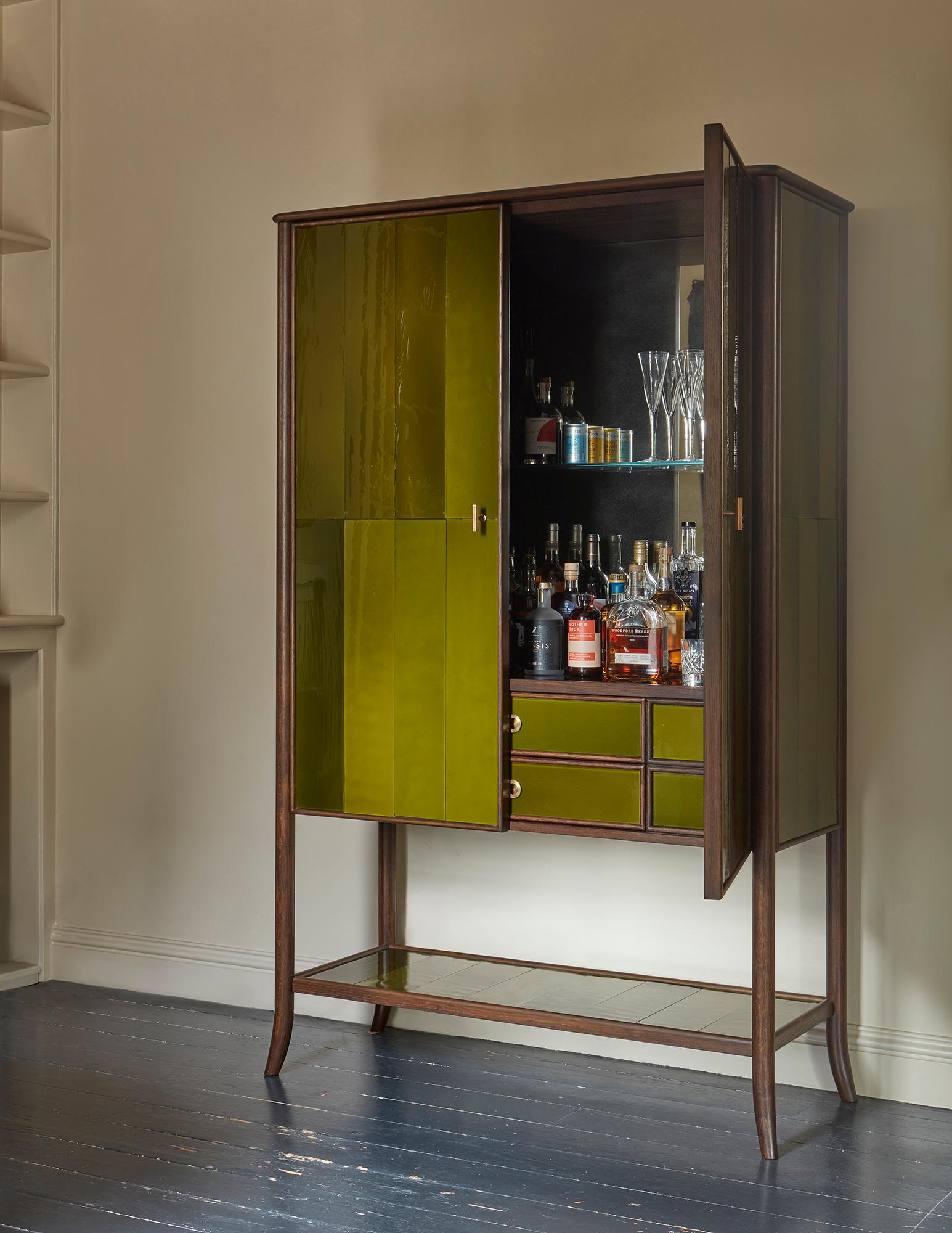 https://a.1stdibscdn.com/rupert-bevan-green-hand-blown-cathedral-glass-cabinet-two-shelves-for-sale-picture-3/f_95862/f_451062321747746339555/250321_Low_res_right_door_open_bespoke_green_cabinet_James_M_master.jpg