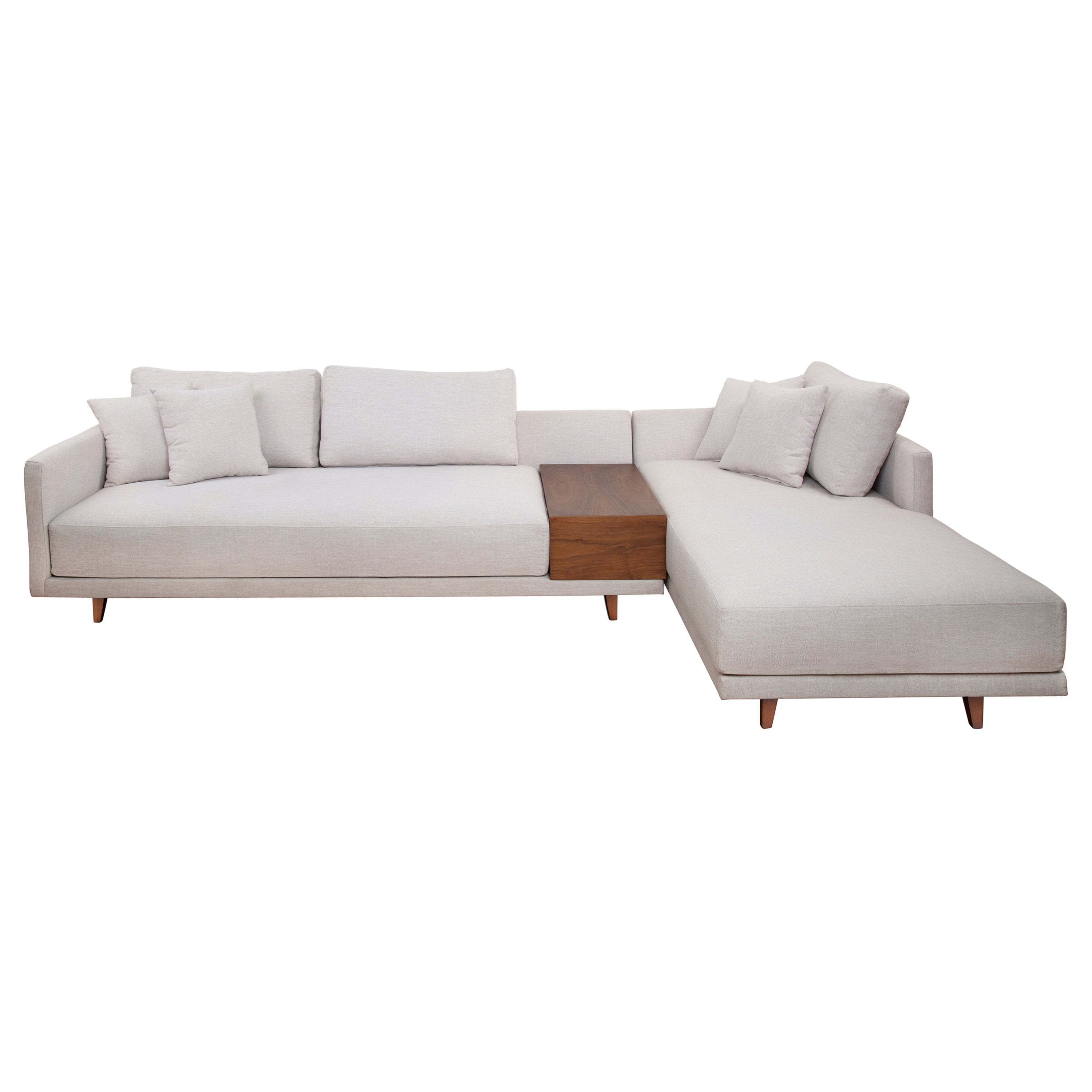 https://a.1stdibscdn.com/l-shaped-sofa-with-built-in-walnut-side-table-with-foam-and-fiber-filling-for-sale/1121189/f_251094521630509522229/25109452_datamatics.jpg