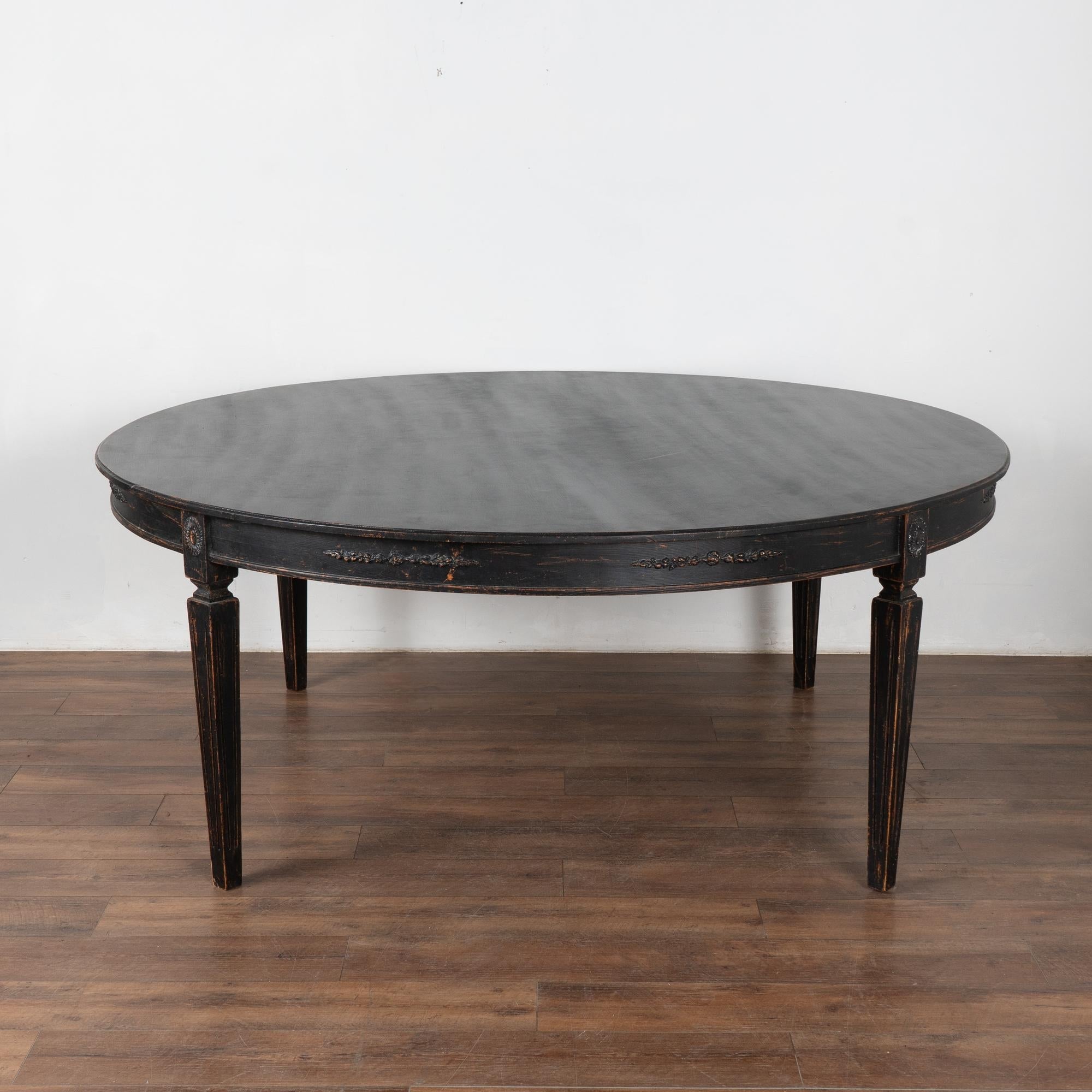 https://a.1stdibscdn.com/large-round-swedish-black-dining-table-reproduction-for-sale-picture-2/f_9236/f_417529221727983366292/25926_001_master.jpg