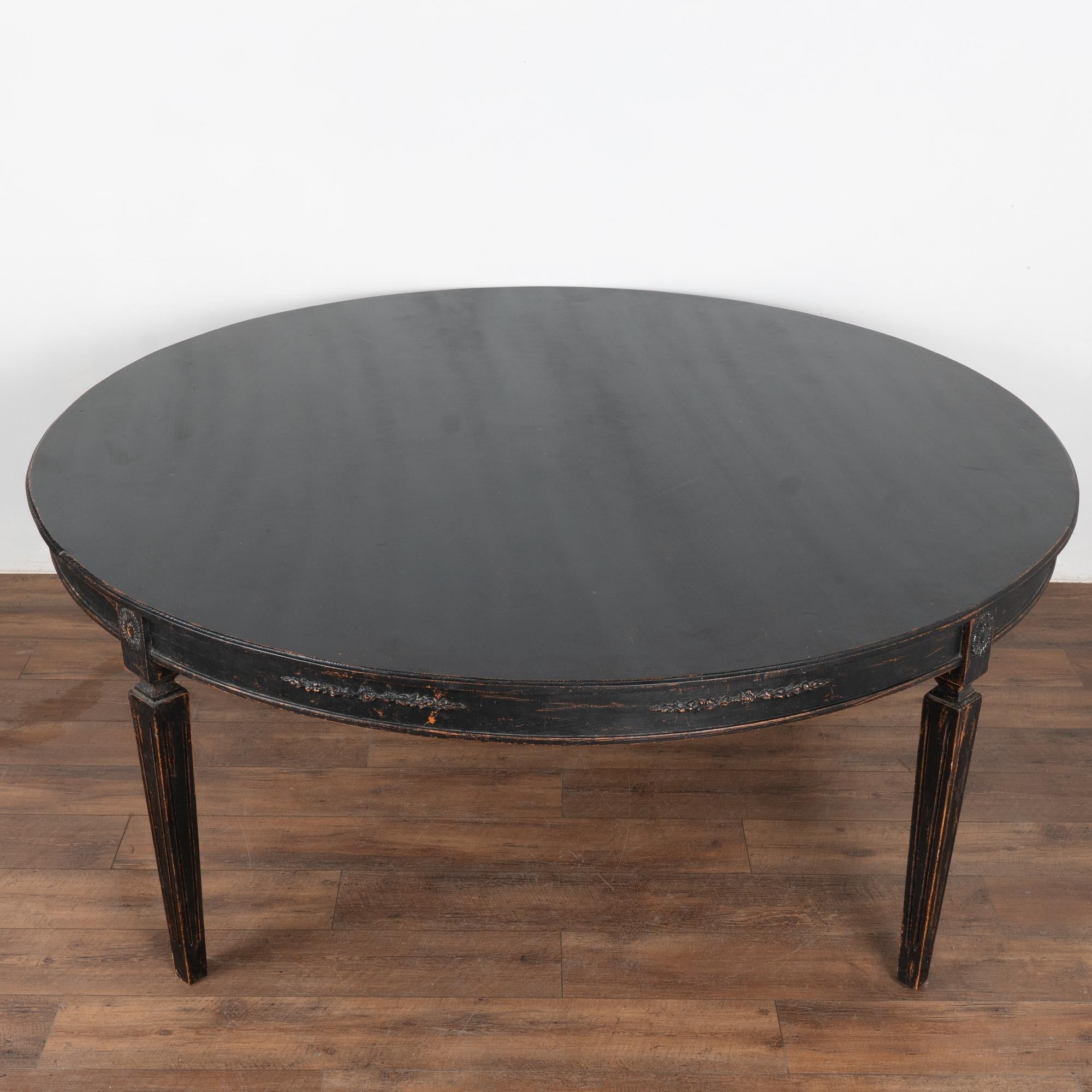 https://a.1stdibscdn.com/large-round-swedish-black-dining-table-reproduction-for-sale-picture-3/f_9236/f_417529221727983316903/25926_007_master.jpg