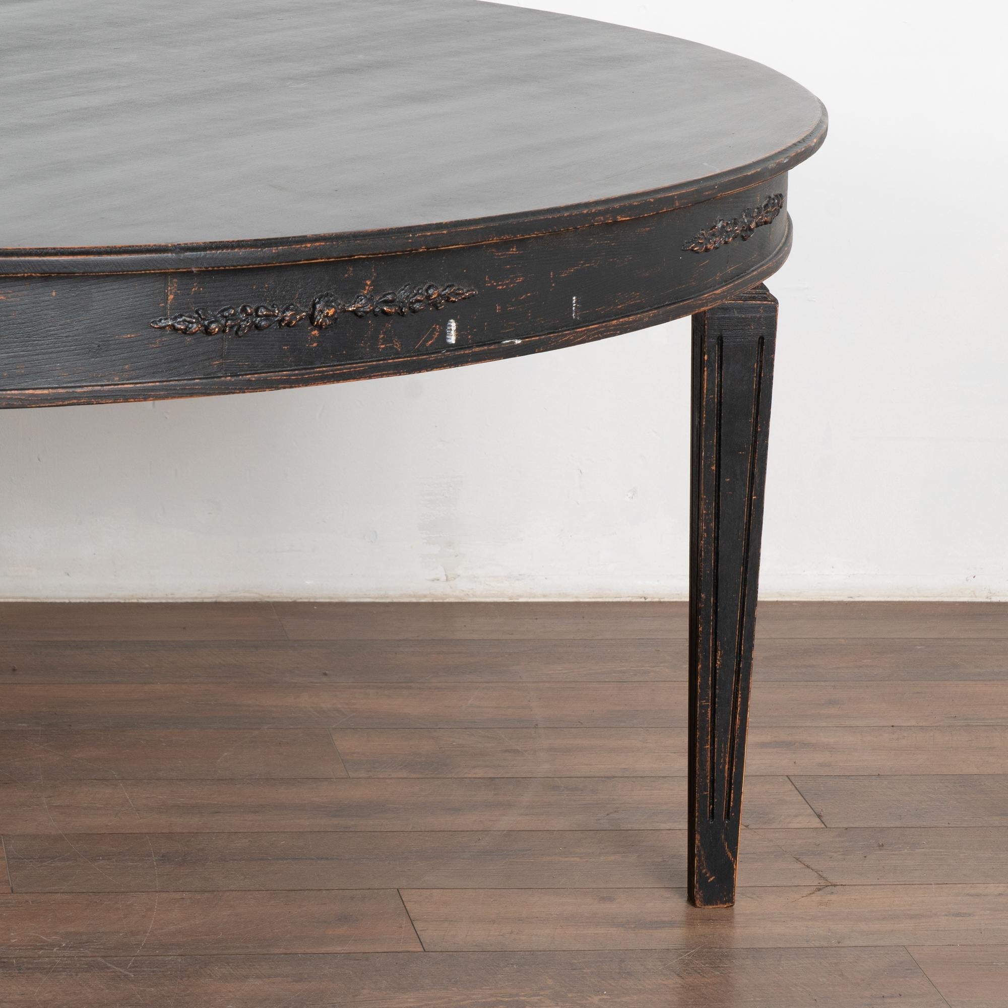 https://a.1stdibscdn.com/large-round-swedish-black-dining-table-reproduction-for-sale-picture-12/f_9236/f_417529221727983317216/25926_010_master.jpg