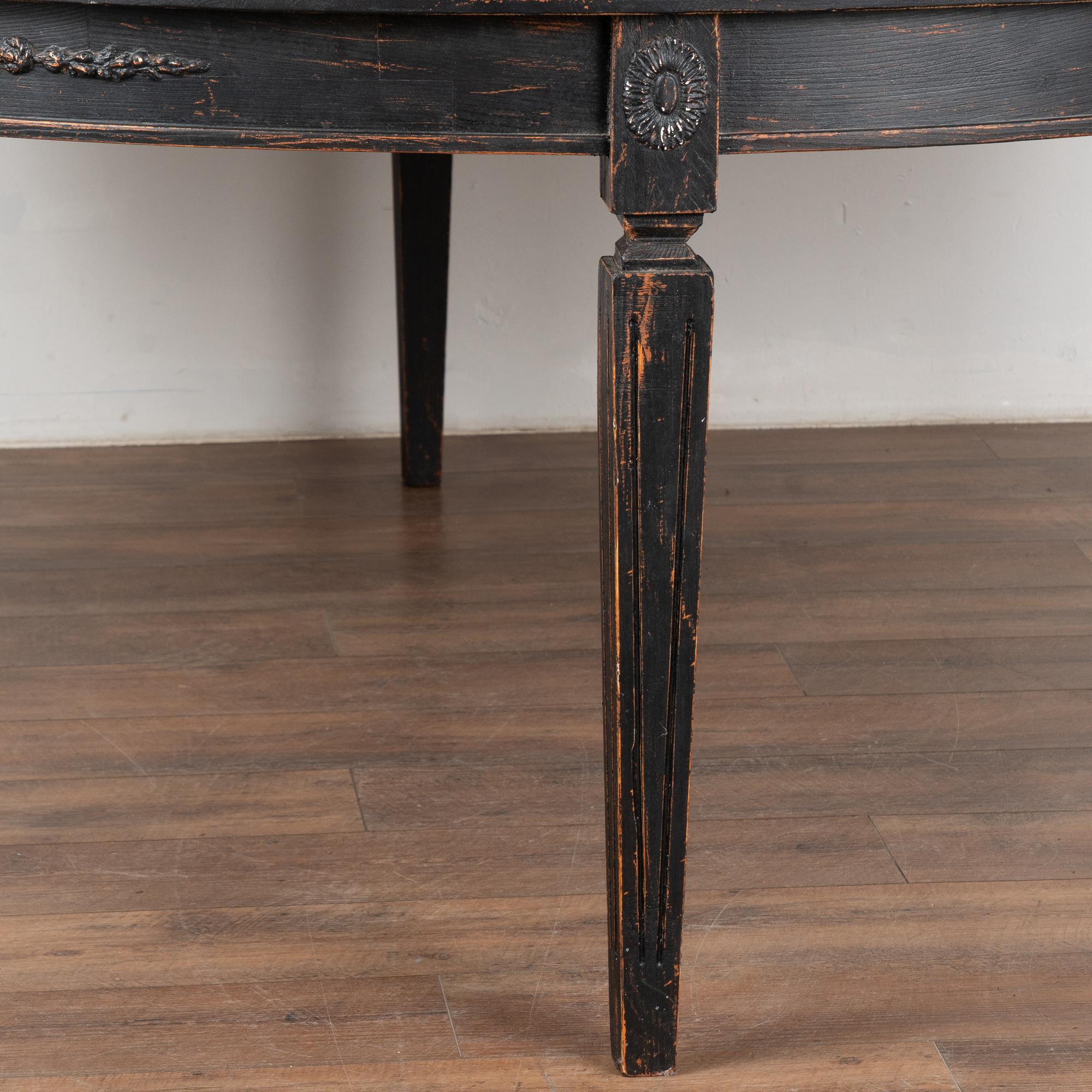 https://a.1stdibscdn.com/large-round-swedish-black-dining-table-reproduction-for-sale-picture-11/f_9236/f_417529221727983320190/25926_012_master.jpg