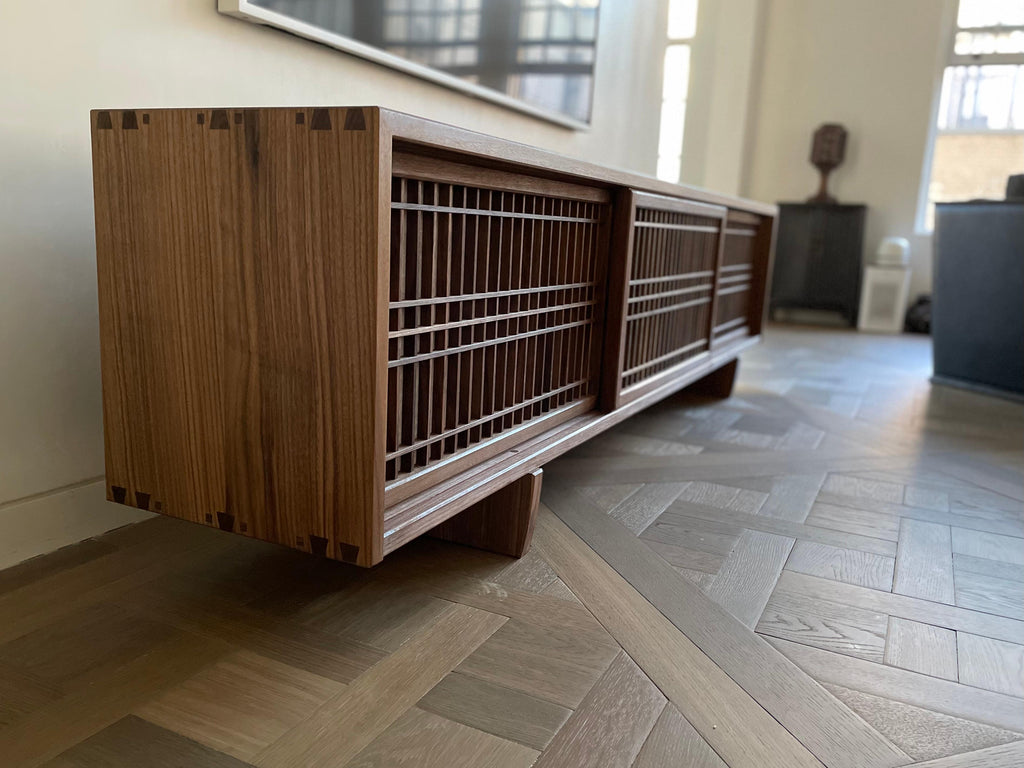 https://a.1stdibscdn.com/walnut-media-console-room-divider-with-sliding-shoji-doors-for-sale-picture-5/f_45782/f_227077621614352114983/2804DBD0_4BA1_4BBC_A5E5_F6AE393DB2F1_master.jpeg
