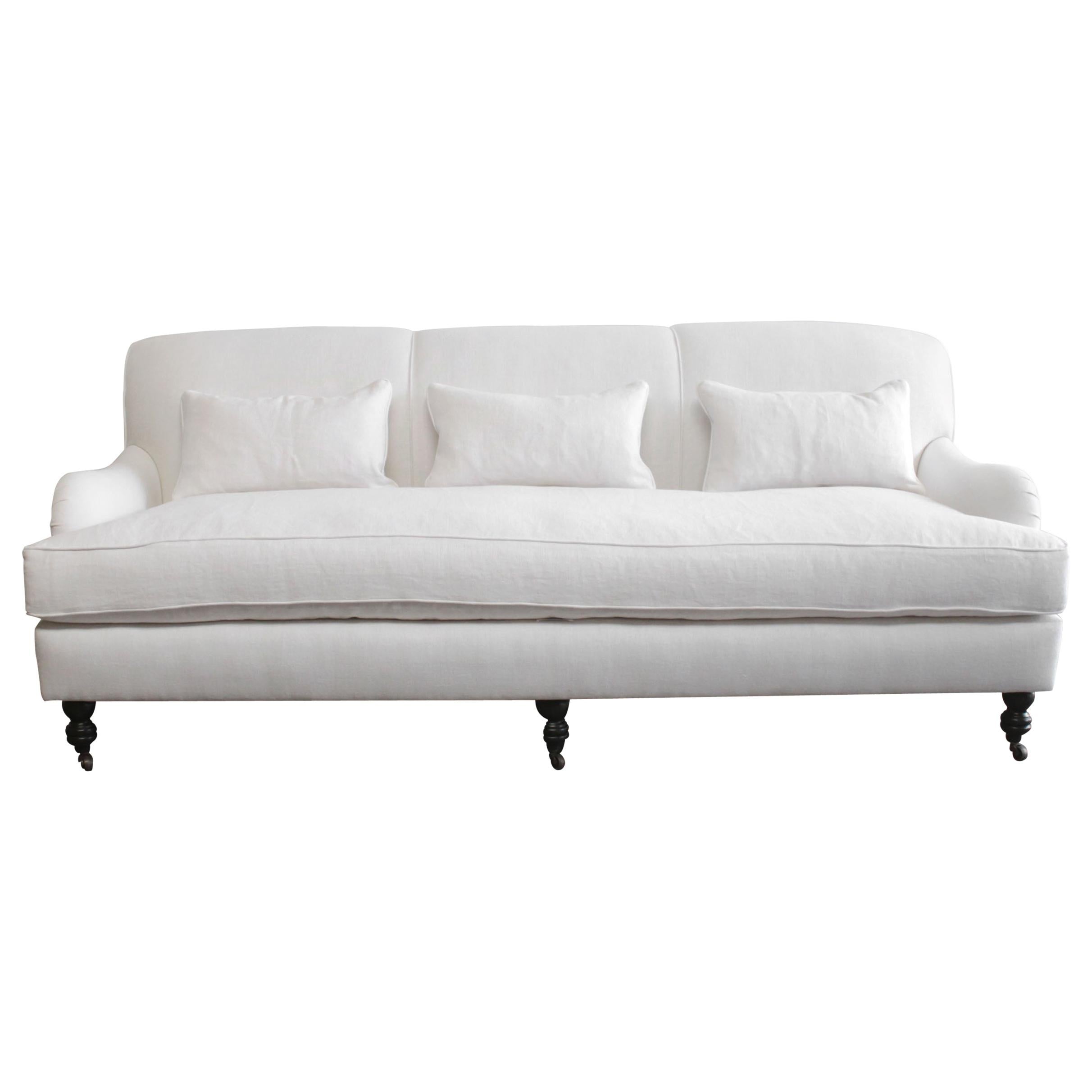 https://a.1stdibscdn.com/custom-made-white-linen-english-arm-rolled-back-sofa-with-casters-for-sale/1121189/f_280593421648900410986/28059342_datamatics.jpg
