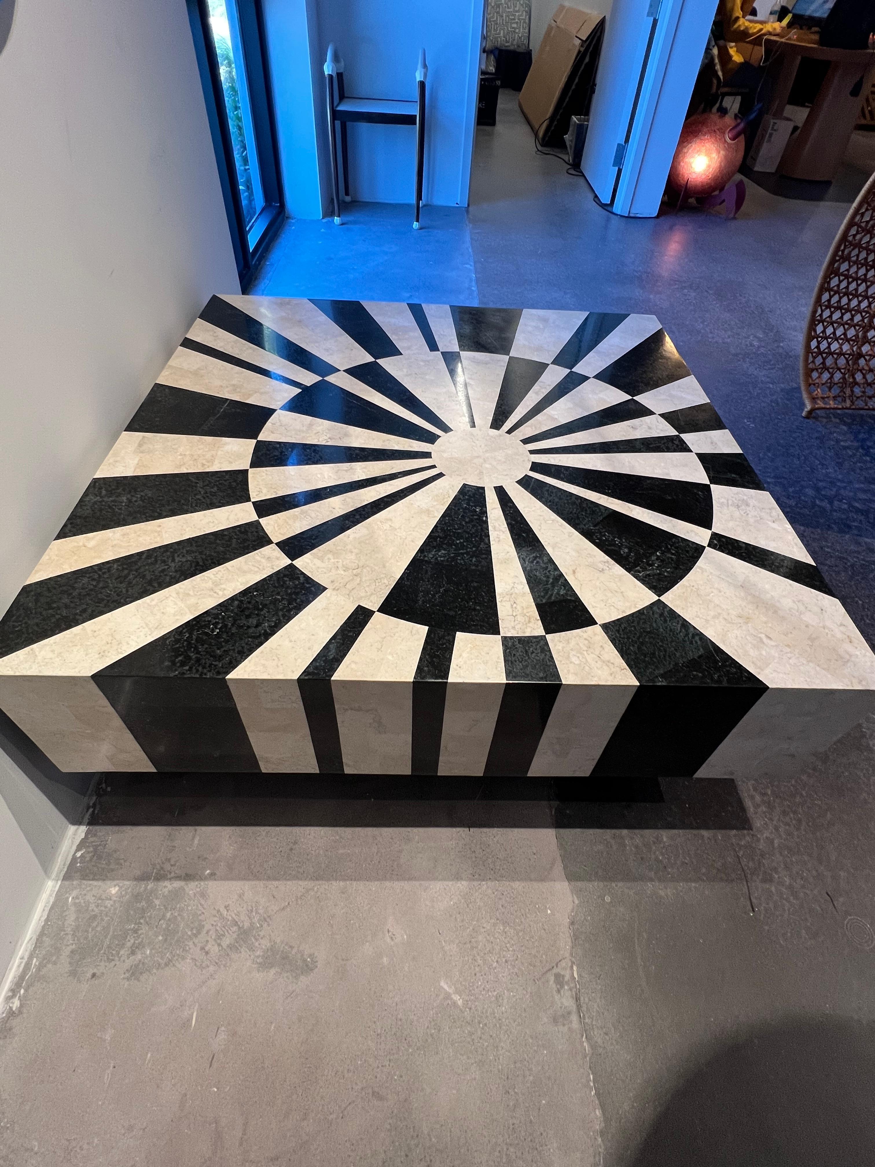 https://a.1stdibscdn.com/fossilized-stone-inlay-coffee-table-for-sale-picture-2/f_79032/f_32255692/2B8B9552_282B_482D_9DFD_1673887136843_master.jpeg