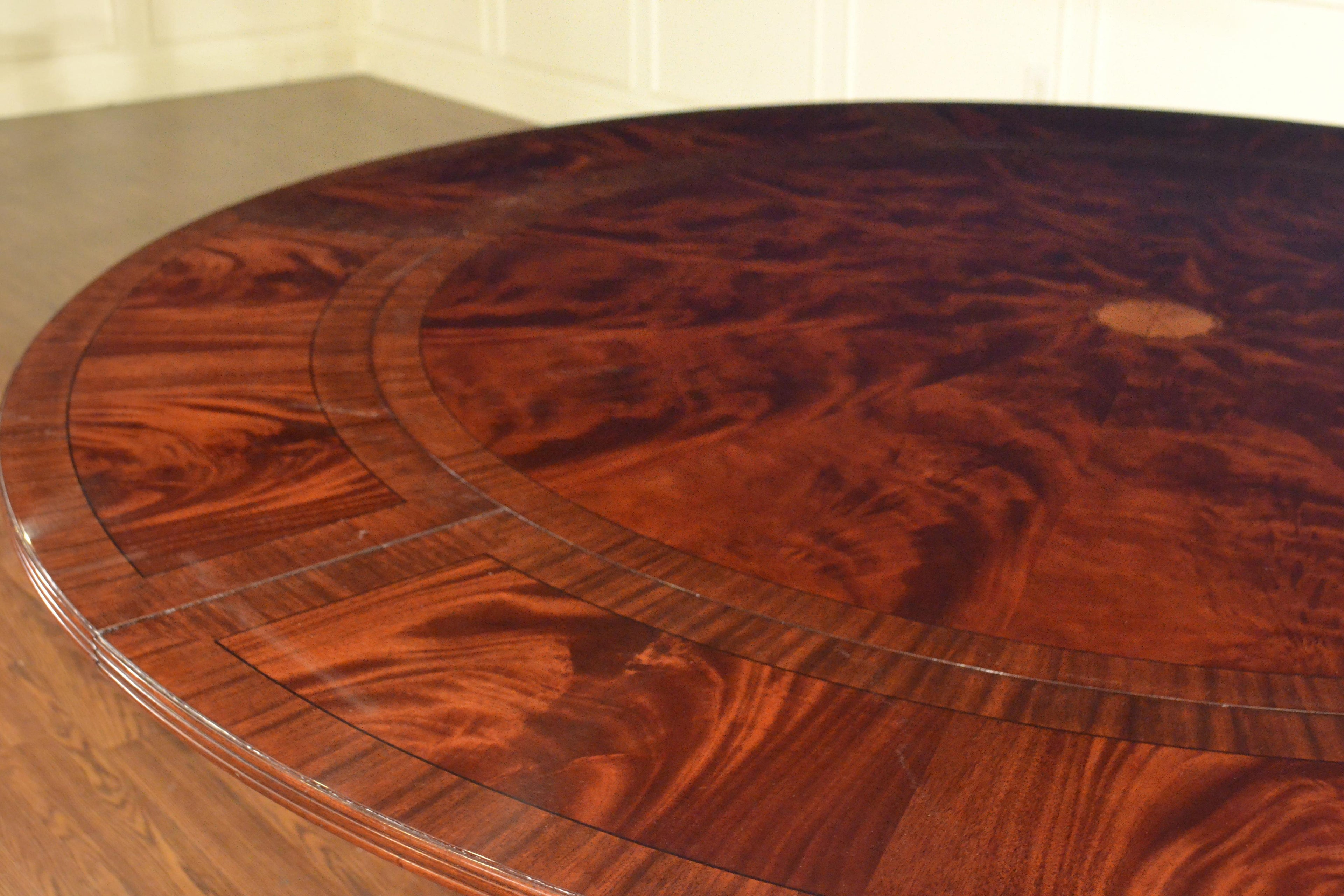 https://a.1stdibscdn.com/large-round-perimeter-leaf-mahogany-georgian-style-dining-table-by-leighton-hall-for-sale-picture-7/f_44162/f_146972821557706012650/2C56A4CE_FB6B_428A_BBB2_23DC3B91D9B2_master.jpeg