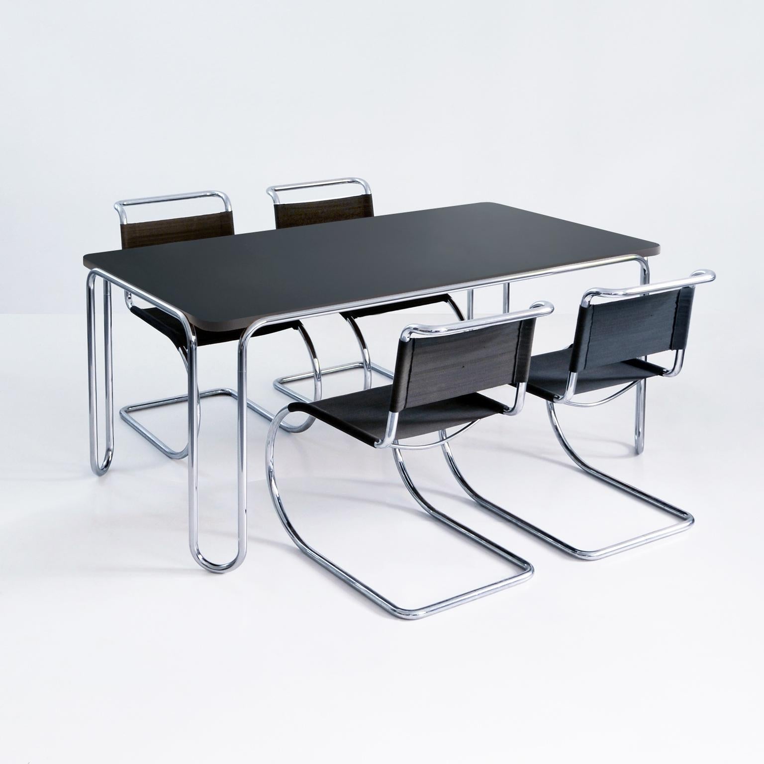 https://a.1stdibscdn.com/modernist-ultra-thin-table-chrome-plated-steel-veneered-wood-customizable-for-sale-picture-3/f_19723/f_466172821757584234168/2_1_master.jpg