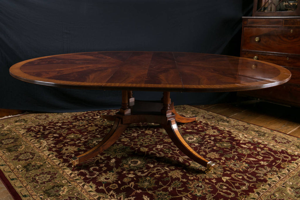 https://a.1stdibscdn.com/custom-english-72-diameter-mahogany-starburst-dining-table-with-leaf-for-sale-picture-10/9420003/f_185103421585523872189/2_IMG_2140_l.jpeg