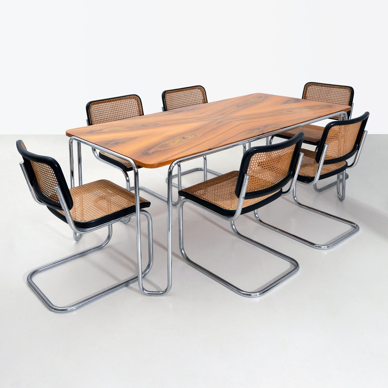 https://a.1stdibscdn.com/modernist-customizable-tubular-steel-table-by-gmd-berlin-veneered-wooden-top-for-sale-picture-4/f_19723/f_271179221643383336931/2_MODERN_XX_GMD_Berlin_Stahlrohr_Schlaufentisch_Tubular_steel_table_master.jpg