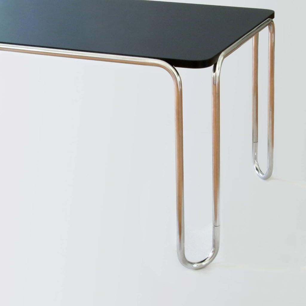 https://a.1stdibscdn.com/modernist-ultra-thin-table-chrome-plated-steel-veneered-wood-customizable-for-sale-picture-4/f_19723/f_466172821757584234684/2_MODERN_XX_GMD_Berlin_Stahlrohr_Schlaufentisch_Tubular_steel_table_master.jpg