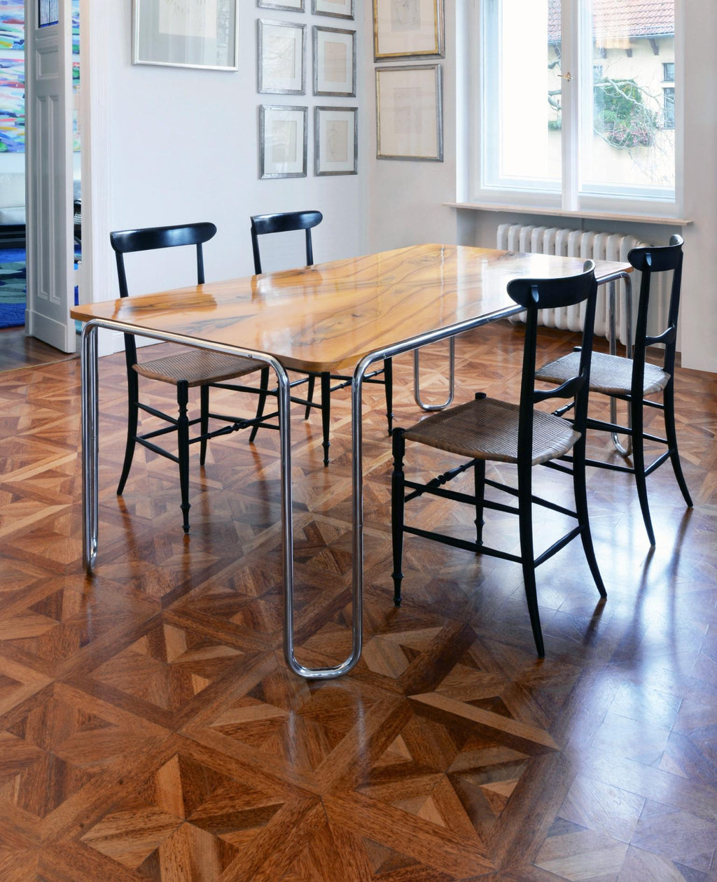 https://a.1stdibscdn.com/modernist-customizable-tubular-steel-table-by-gmd-berlin-veneered-wooden-top-for-sale-picture-3/f_19723/f_271179221643383404392/2_MODERN_XX_Giuseppe_G_Descalzi_Chiavarina_Esszimmerstuehle_Chiavarina_dining_chairs_1940_master.jpg