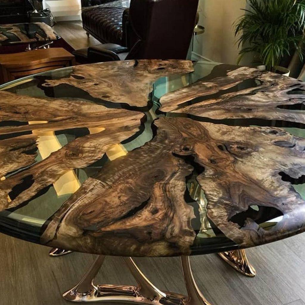 https://a.1stdibscdn.com/medma-round-dining-table-premium-olive-wood-cast-aluminum-for-sale-picture-4/f_96082/f_385512921708730268133/2_master.jpg