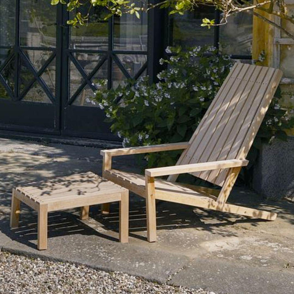 https://a.1stdibscdn.com/stine-weigelt-outdoor-between-lines-teak-lounge-chair-for-skagerak-for-sale-picture-2/f_14472/f_342701921684003129844/2_master.jpg