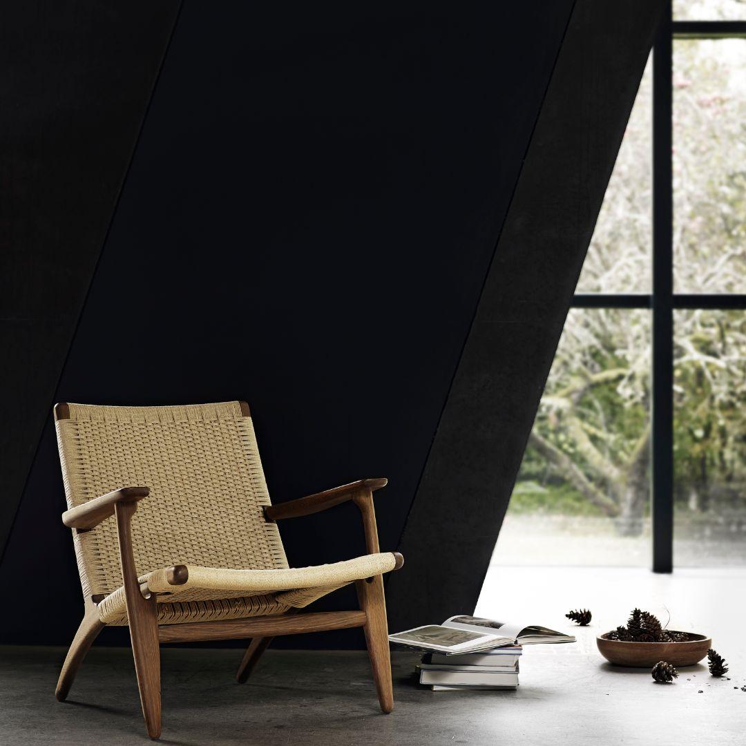 https://a.1stdibscdn.com/hans-j-wegner-ch25-chair-in-walnut-oil-papercord-for-carl-hansen-son-for-sale-picture-2/f_14472/f_316522321670534986029/2_master.jpg