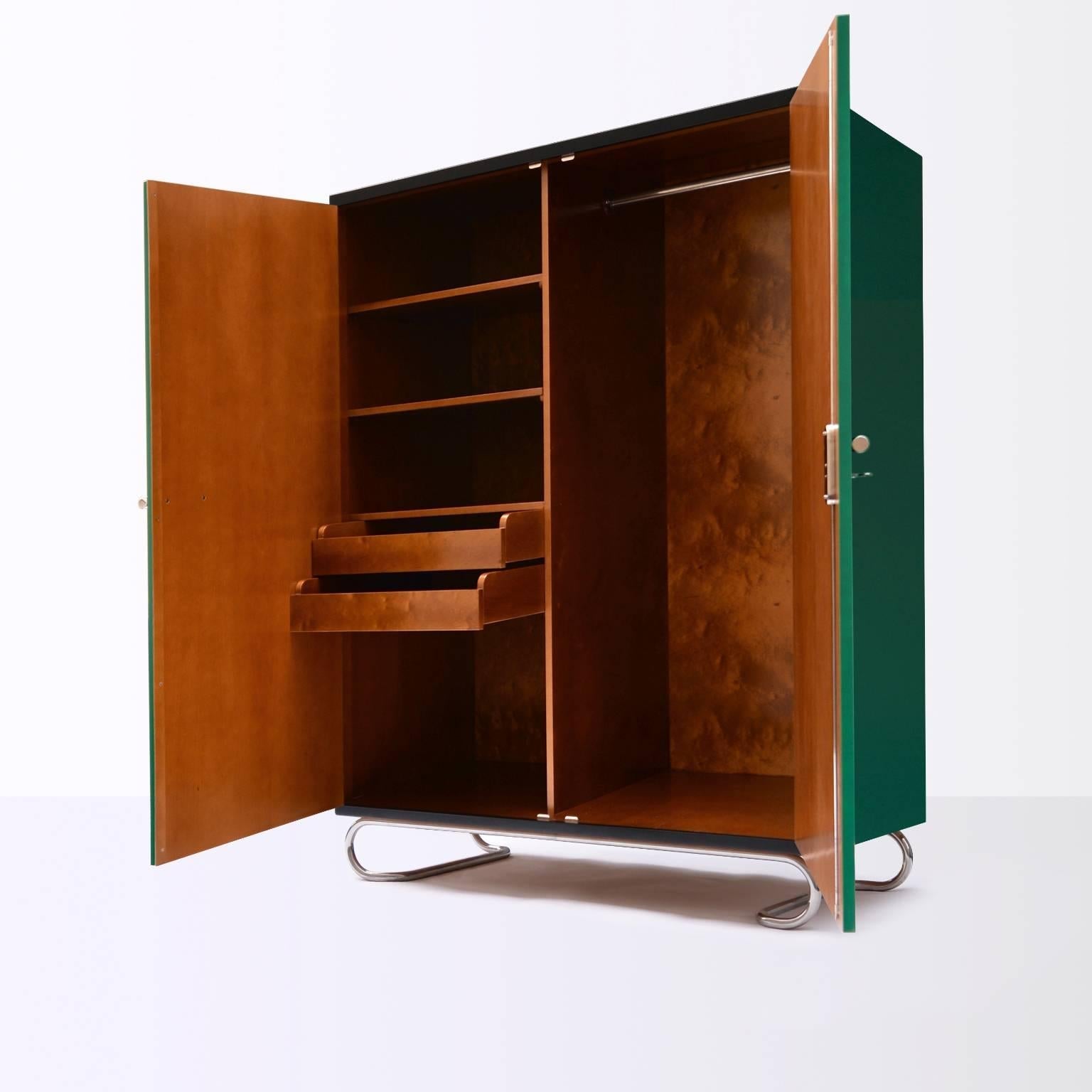 https://a.1stdibscdn.com/customizable-storage-cabinet-in-lacquered-wood-and-tubular-steel-hardware-for-sale-picture-3/f_19723/f_410817621723736141139/2_master.jpg
