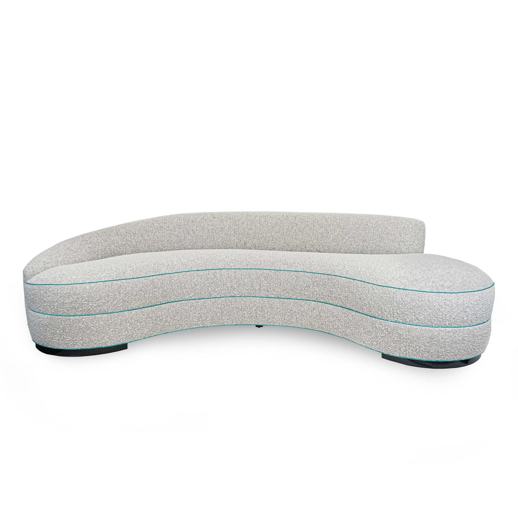 https://a.1stdibscdn.com/boucle-curved-sofa-with-turquoise-accents-for-sale-picture-2/f_21233/1622750898030/2_master.jpg