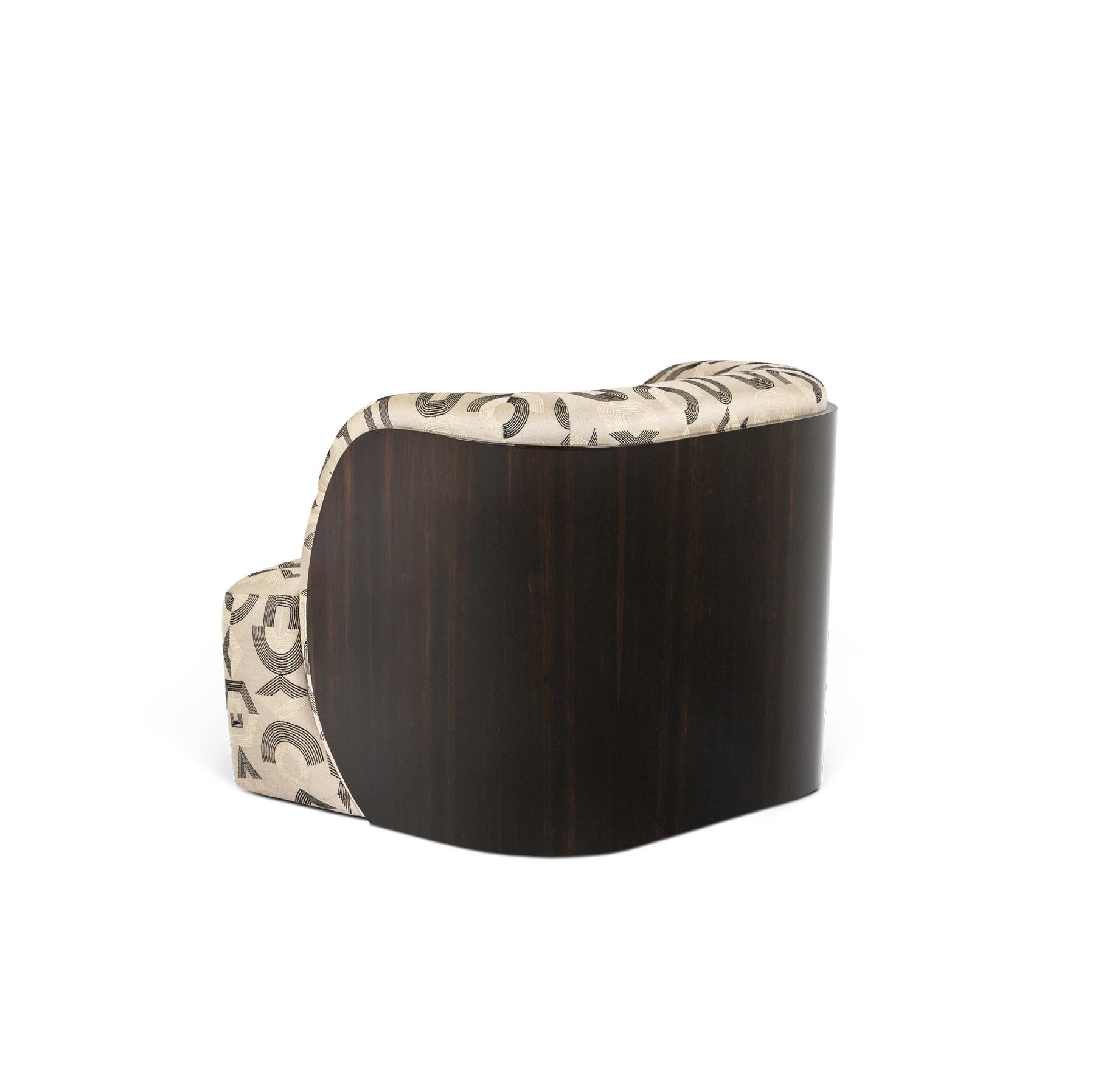 https://a.1stdibscdn.com/upholstered-armchair-with-ebony-wood-frame-and-wraparound-back-for-sale-picture-2/f_27693/f_463096421755502123177/2_master.jpg