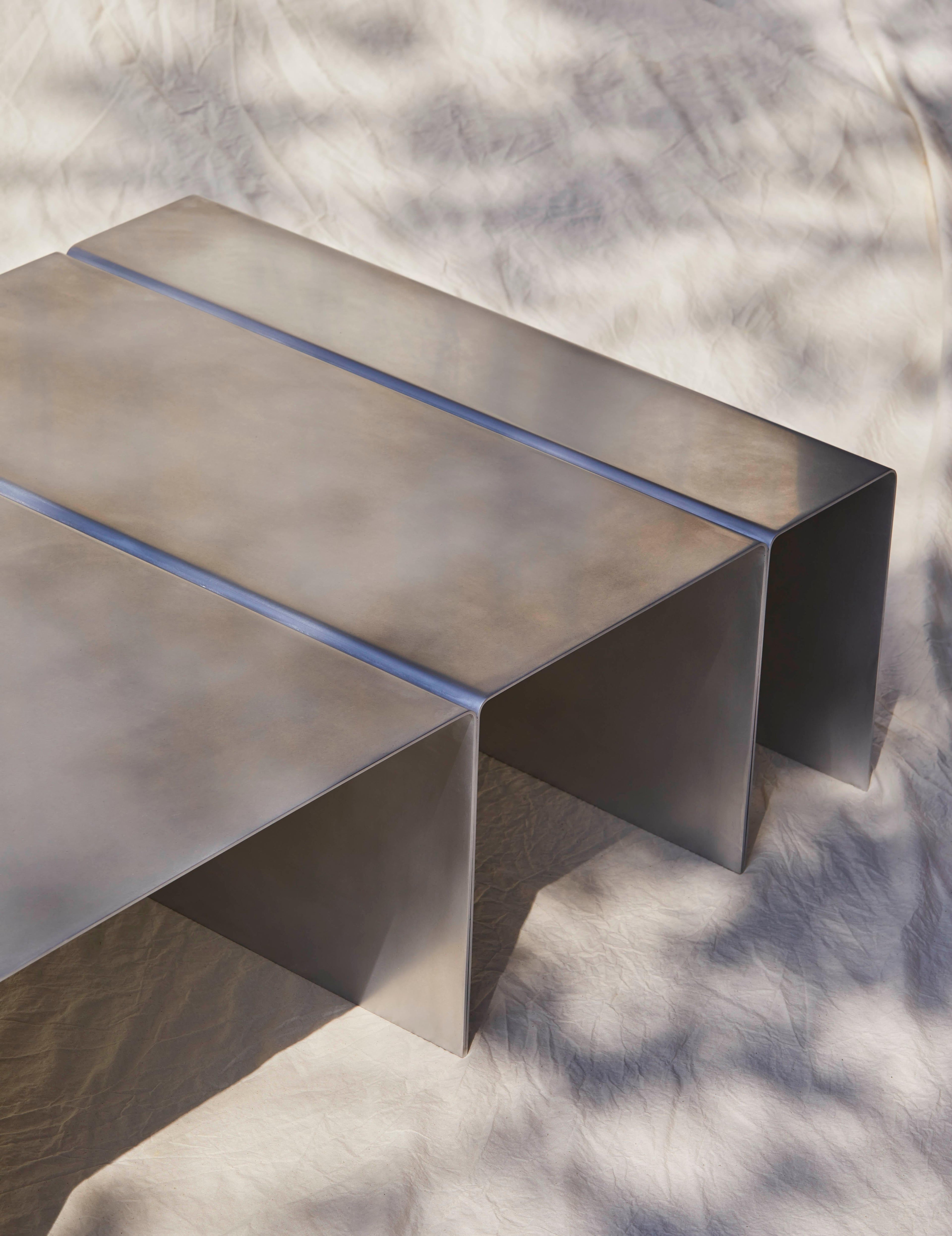 https://a.1stdibscdn.com/segment-coffee-table-contemporary-waxed-aluminum-table-by-estudio-persona-for-sale-picture-2/f_23783/1550874591494/2_master.jpg