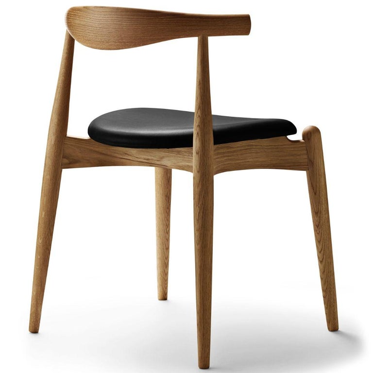 https://a.1stdibscdn.com/hans-j-wegner-ch20-chair-in-oak-black-leather-and-oil-for-carl-hansen-son-for-sale-picture-3/f_14472/f_316338121670436401542/2_master.jpg?width=768