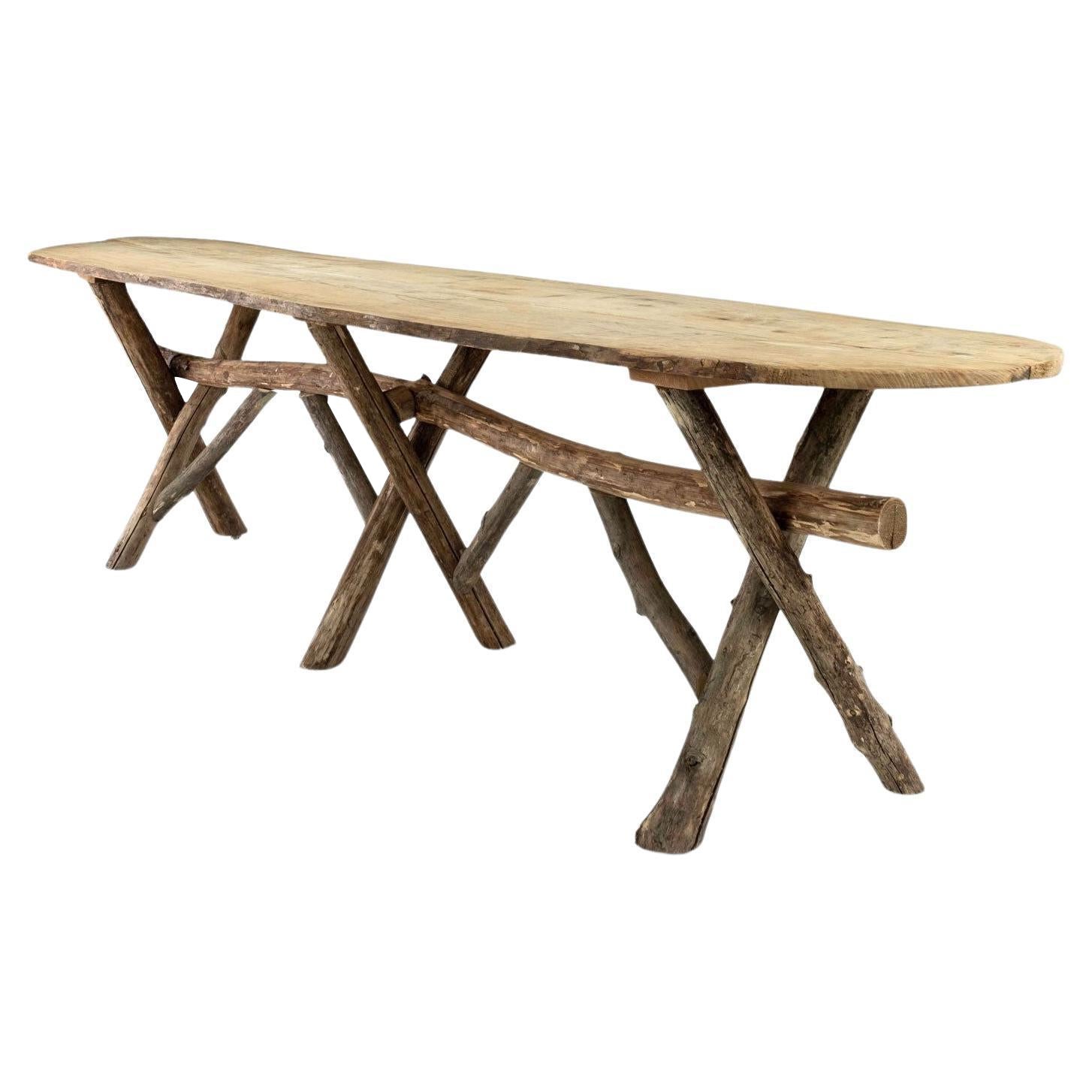 https://a.1stdibscdn.com/long-live-edge-oval-top-table-with-natural-shaped-trestle-base-for-sale/1121189/f_308523121774961591930/30852312_datamatics.jpg