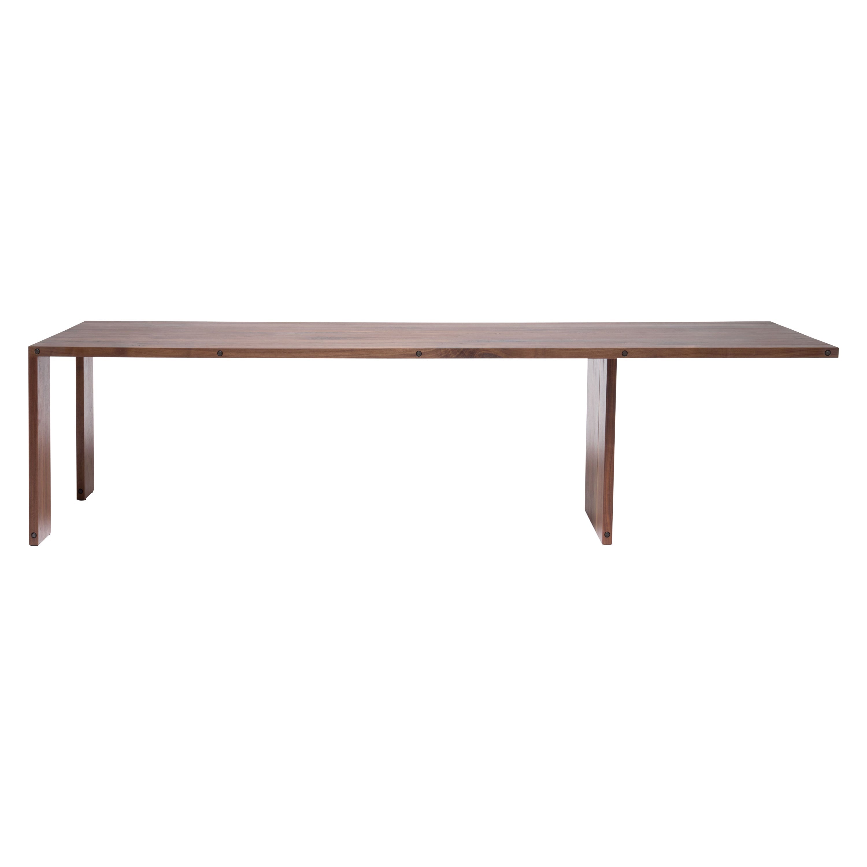 https://a.1stdibscdn.com/compression-dining-table-in-walnut-wood-for-sale/1121189/f_309954621675445419173/30995462_datamatics.jpg